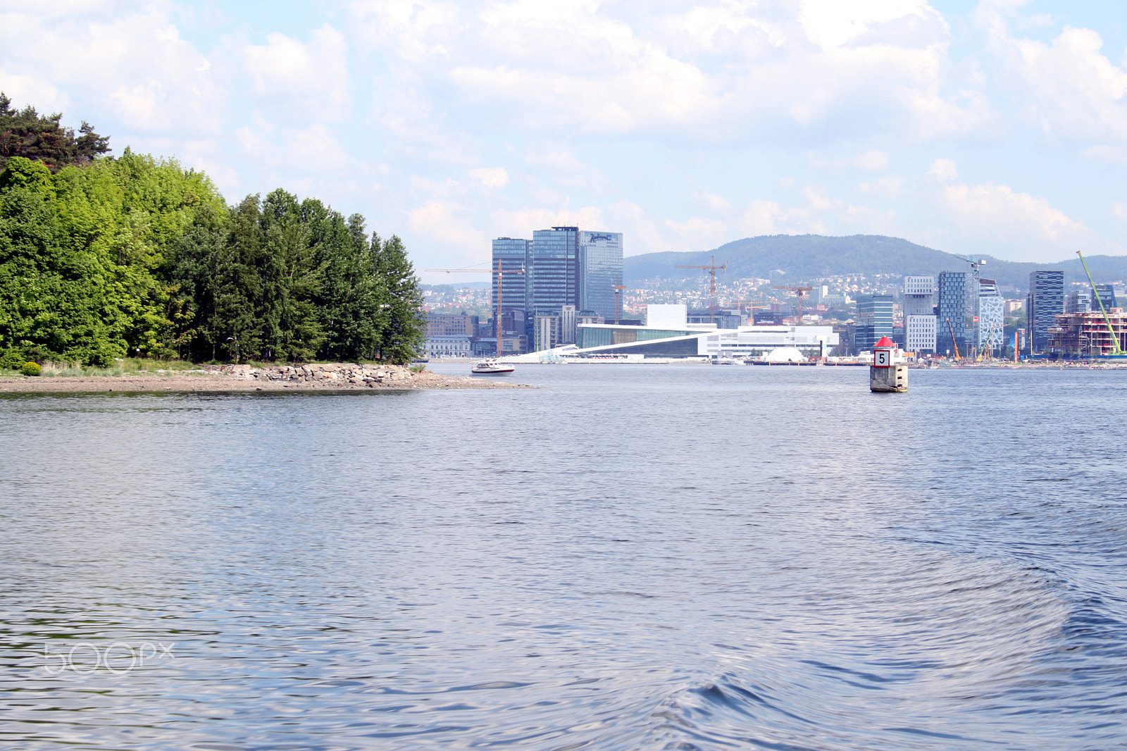 Canon EF-S 18-55mm F3.5-5.6 sample photo. Island, buoy and cityscape, oslo photography
