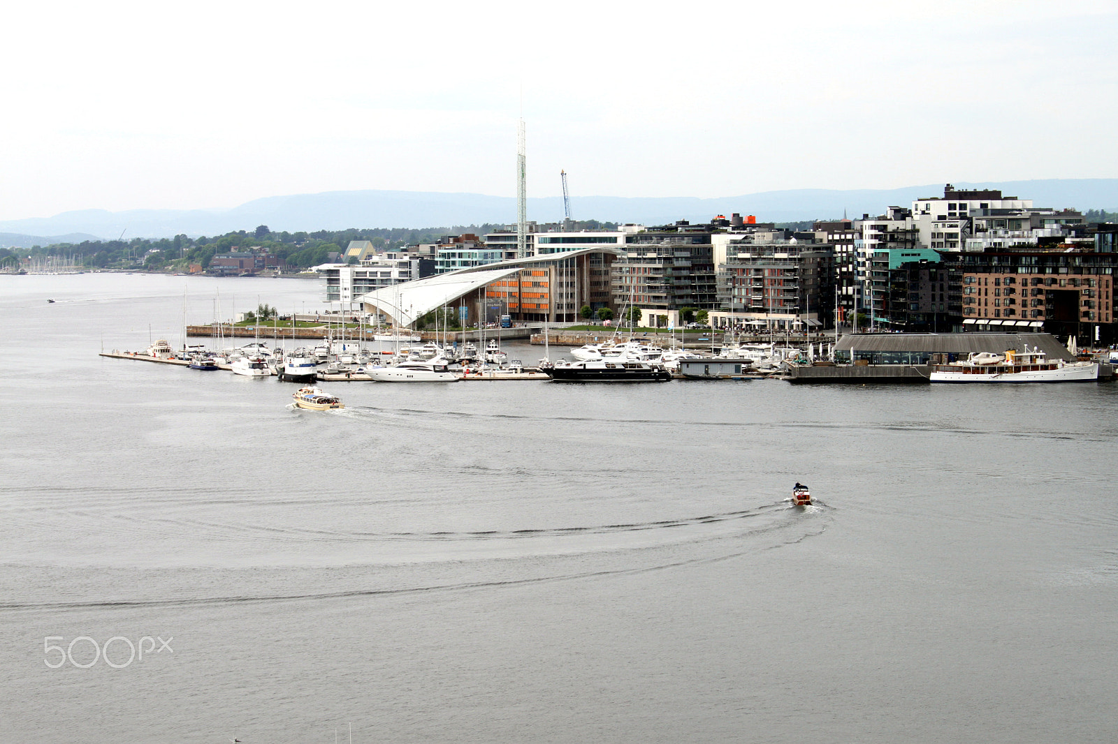 Canon EF-S 18-55mm F3.5-5.6 sample photo. Boats turning on the fjord in oslo photography