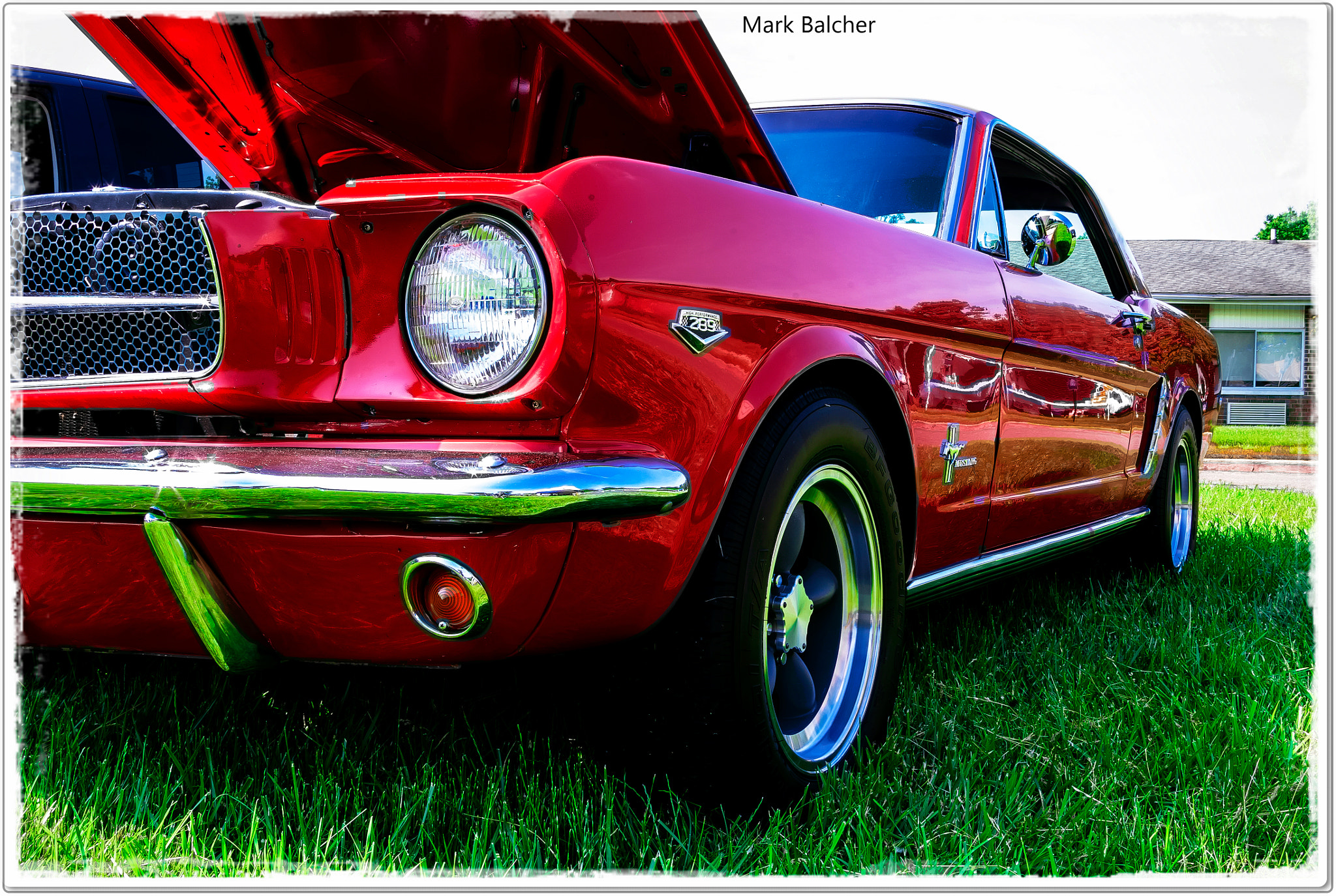 Pentax K-x sample photo. A beautiful bright red '65 ford mustang. pristine. photography