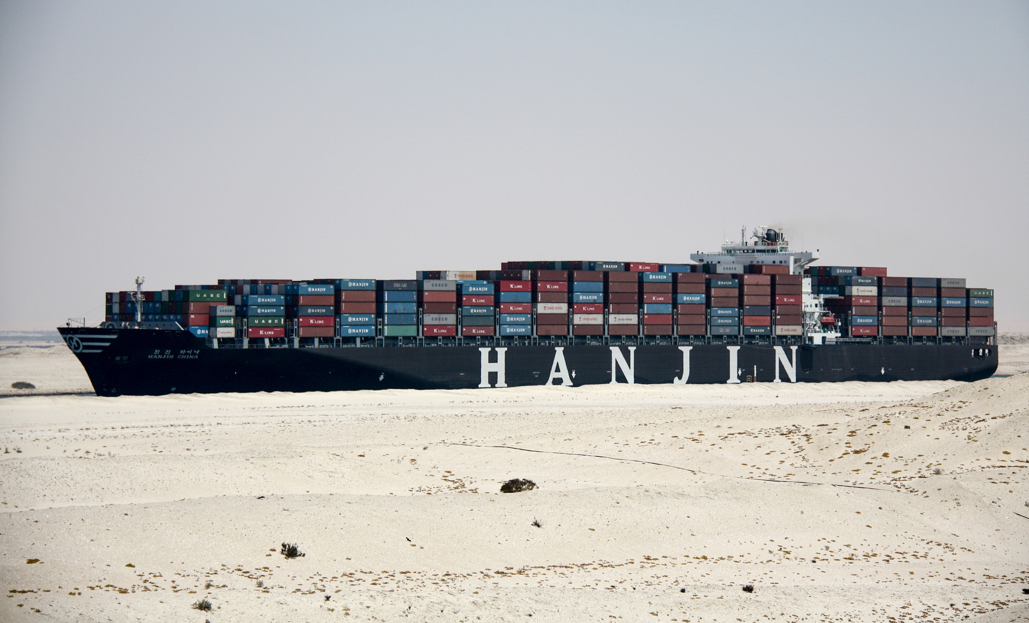 .5-5.6 IS sample photo. Container vessel sailing through the suez canal.. where is the water?... photography