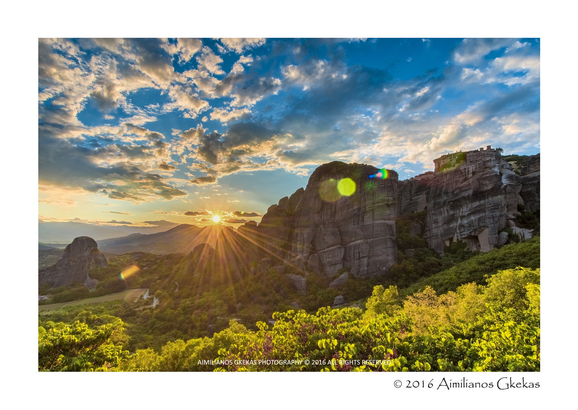 Canon EOS 760D (EOS Rebel T6s / EOS 8000D) + Canon EF-S 10-18mm F4.5–5.6 IS STM sample photo. Sunset behind meteora rocks photography