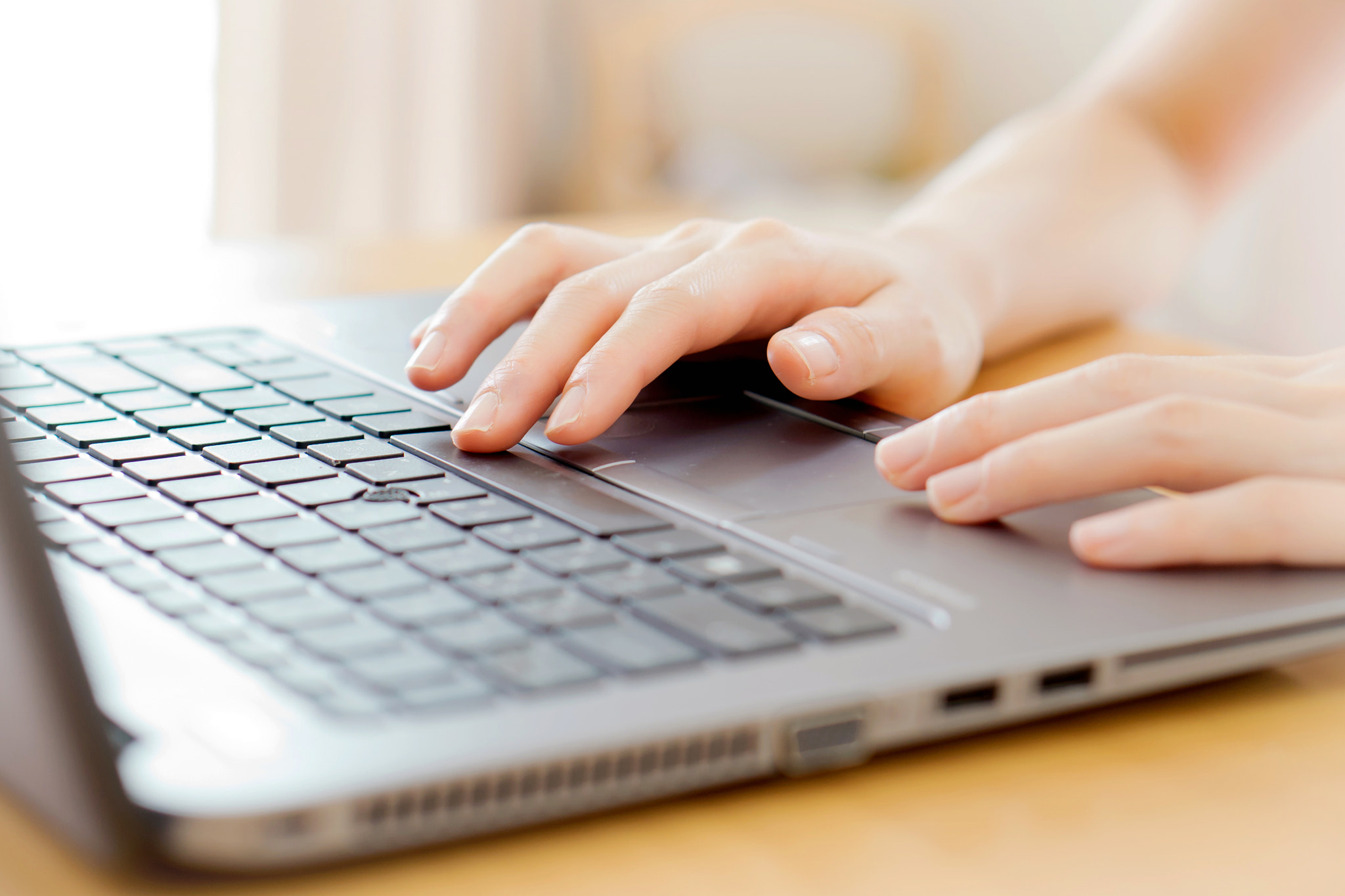 Sony a7 + E 50mm F1.8 OSS sample photo. Woman working at home office hand on keyboard close up photography