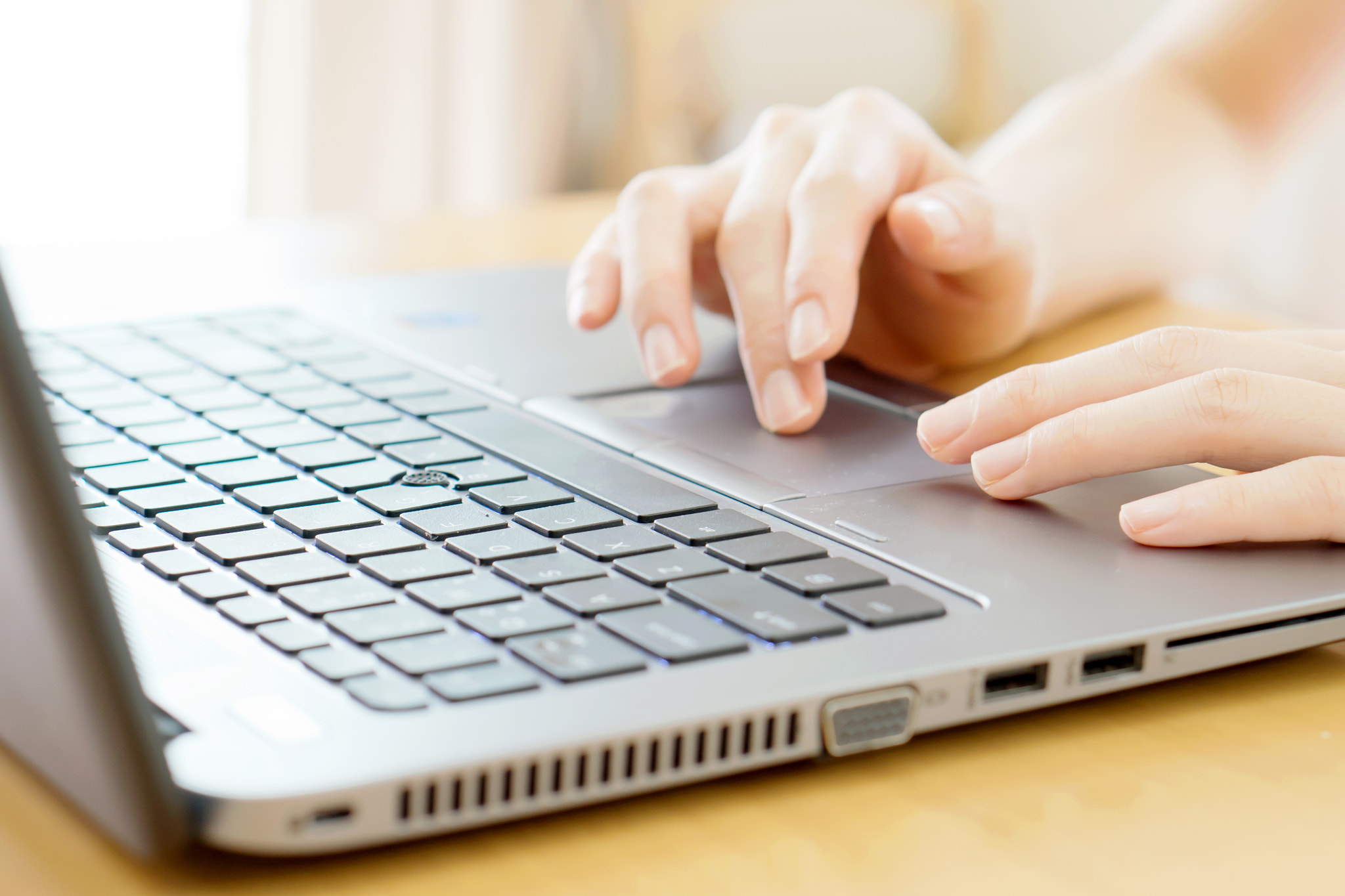 Sony a7 + E 50mm F1.8 OSS sample photo. Woman working at home office hand on keyboard close up photography