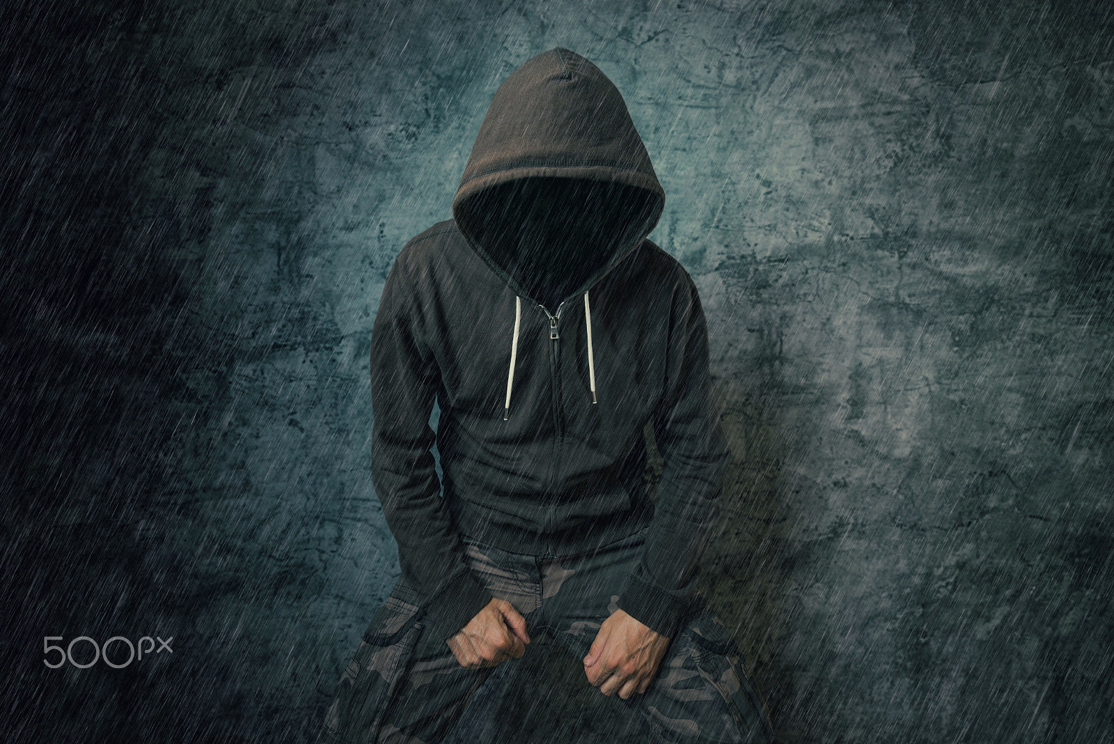 Tamron SP 15-30mm F2.8 Di VC USD sample photo. Spooky evil criminal person with hooded jacket in rain photography