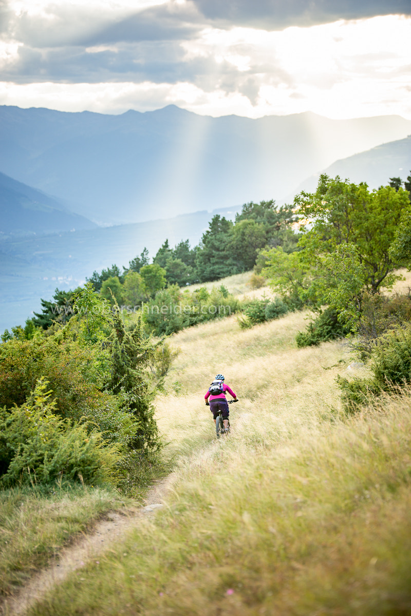 Sony a99 II + Tamron SP 70-200mm F2.8 Di VC USD sample photo. Mountain biking in south tyrol, italy photography