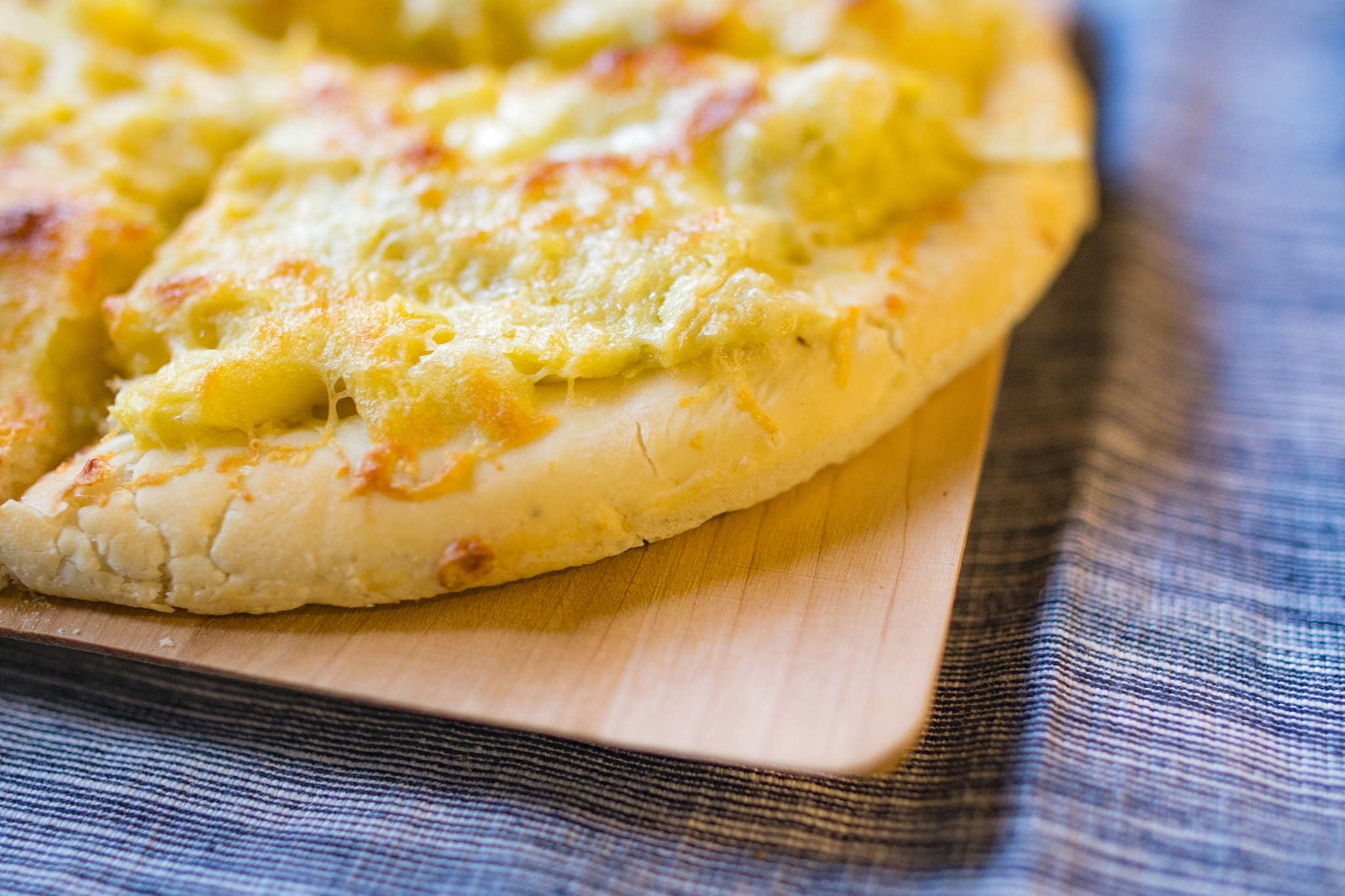 Canon EOS 70D + Canon EF 24mm F1.4L II USM sample photo. Durian cheese pizza photography