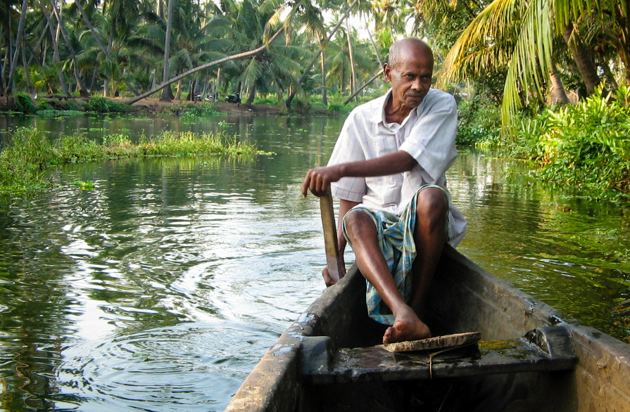 Canon POWERSHOT A400 sample photo. Boat man photography