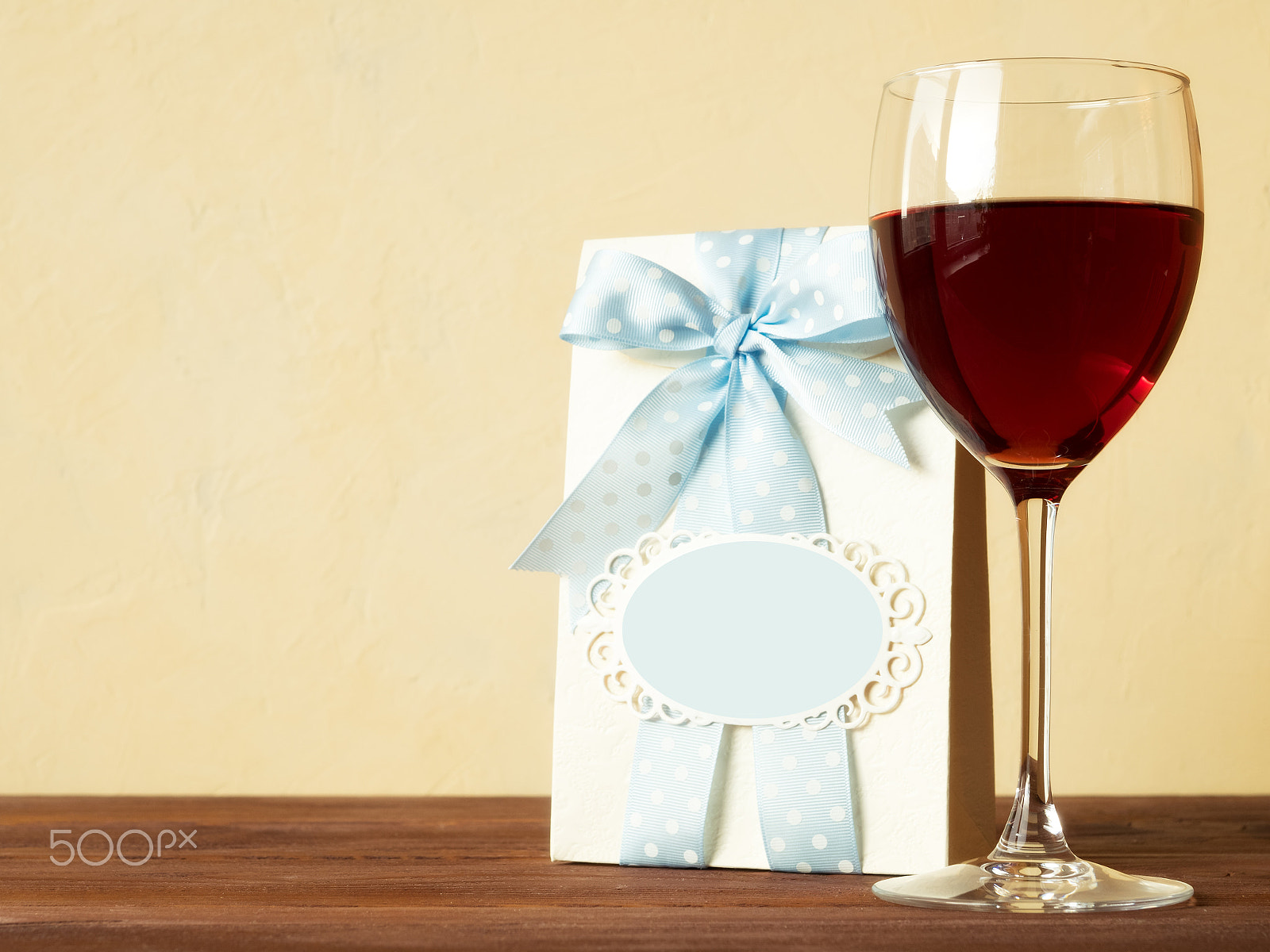 Olympus OM-D E-M1 + OLYMPUS 14-54mm Lens sample photo. Glass of wine on the table photography