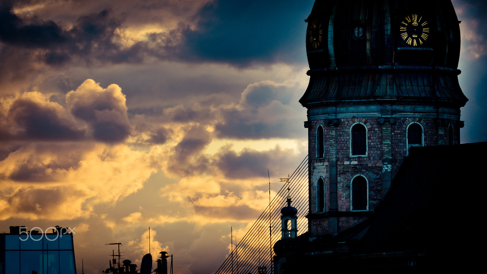 Panasonic Lumix DMC-GH4 sample photo. Orange sunset view in old town riga photography