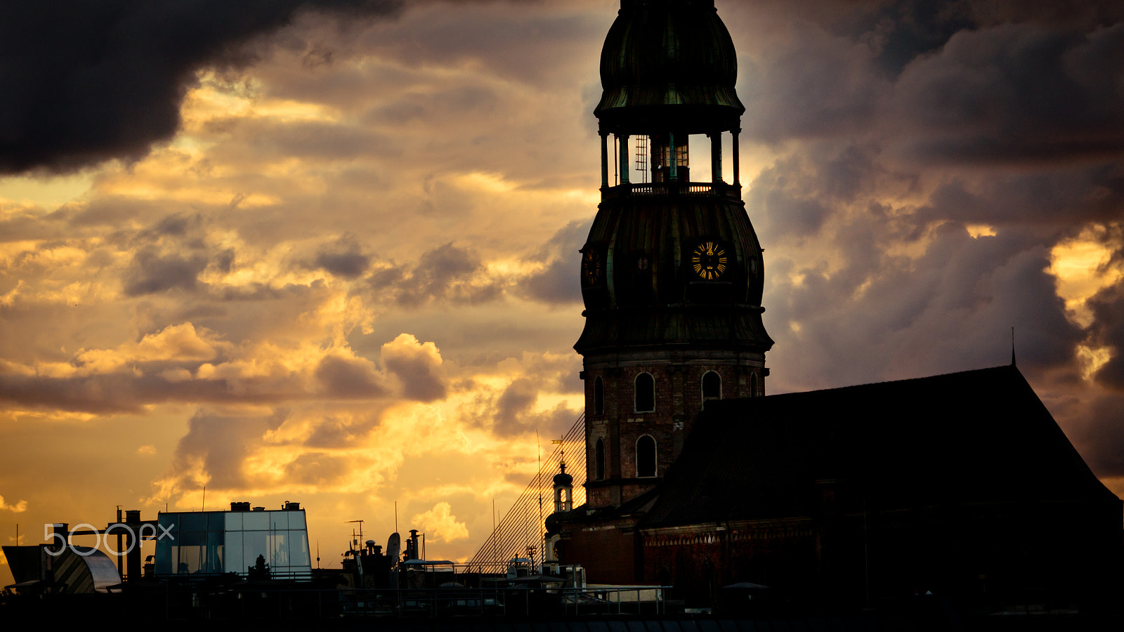 Panasonic Lumix DMC-GH4 sample photo. Orange sunset view in old town riga photography