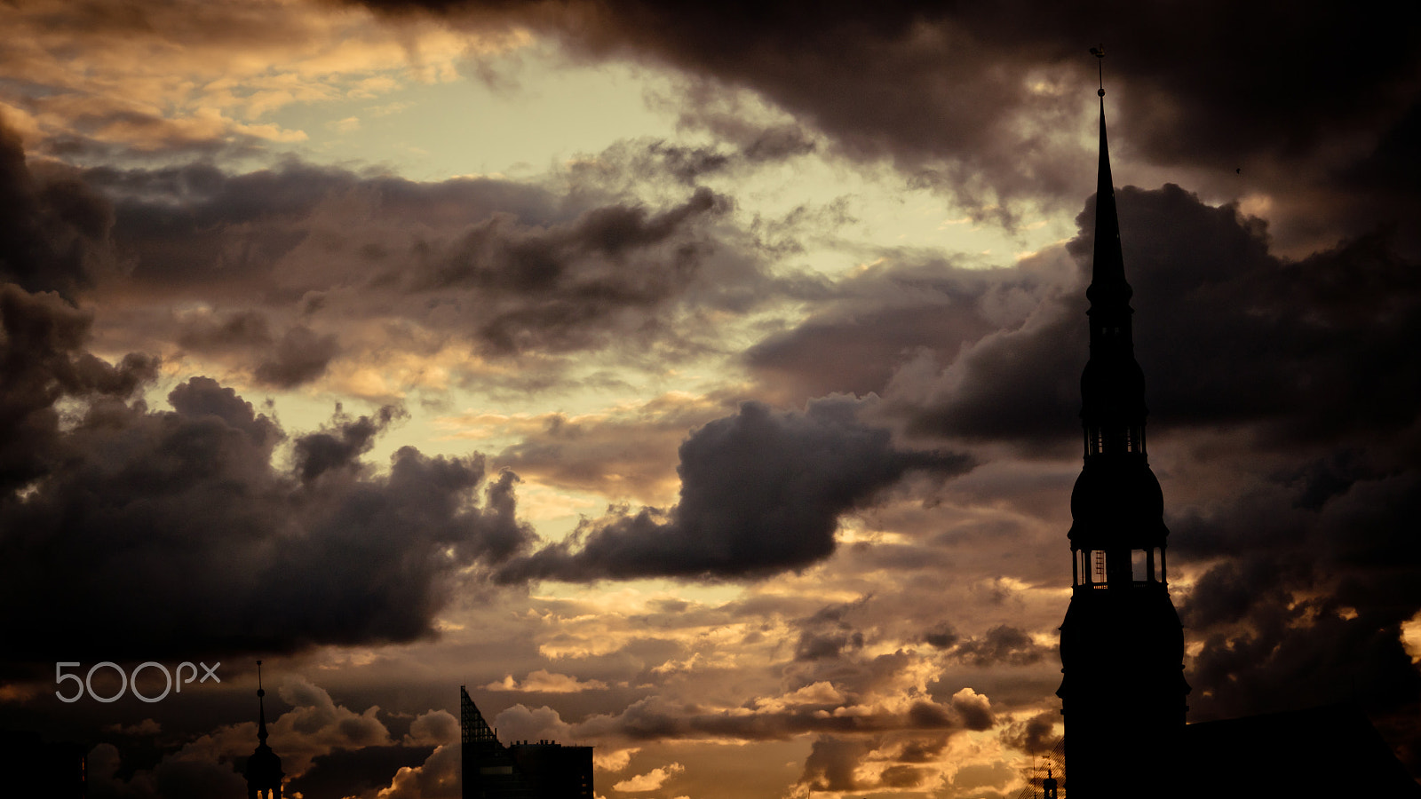 Panasonic Lumix DMC-GH4 sample photo. Orange sunset view in old town riga photography