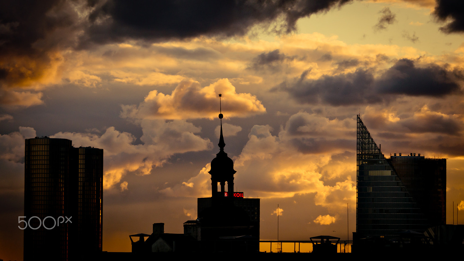 Panasonic Lumix DMC-GH4 sample photo. Orange sunset view in old town riga photography