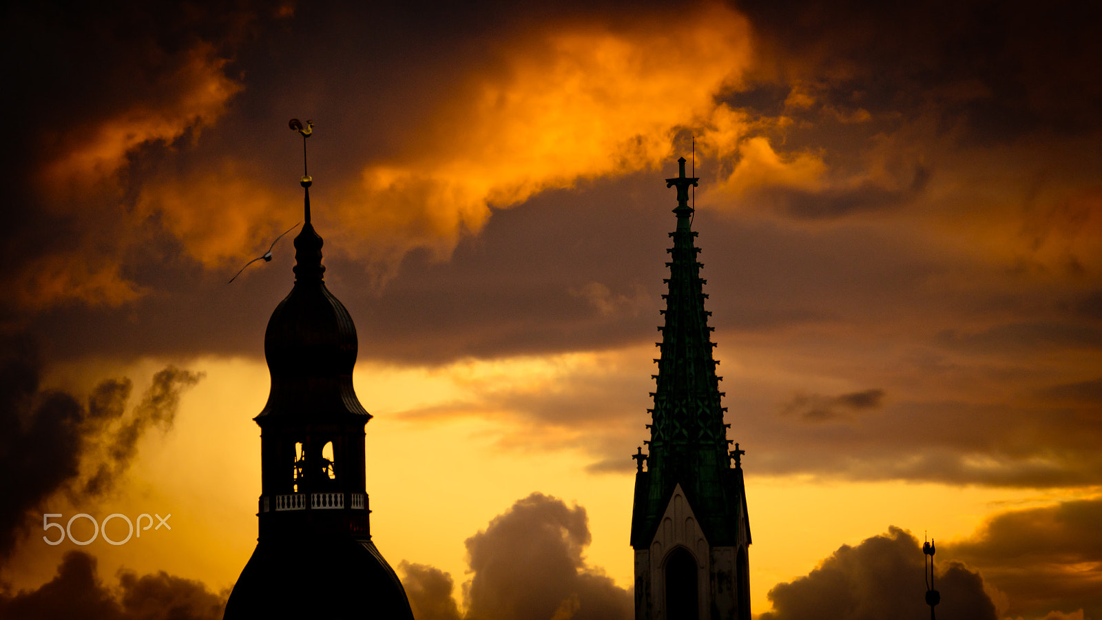 Panasonic Lumix DMC-GH4 sample photo. Orange sunset view in old town riga photography