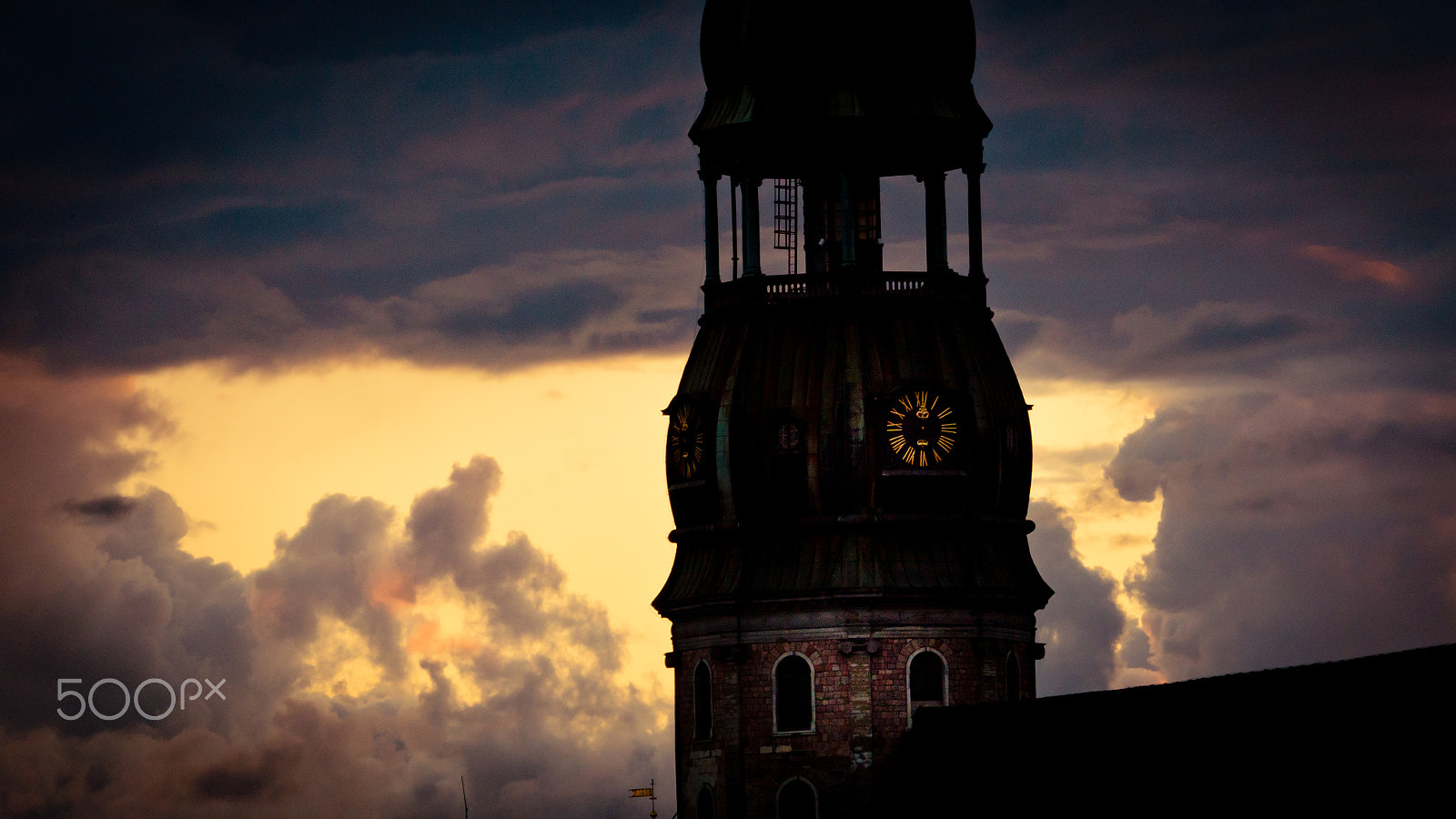 Panasonic Lumix DMC-GH4 sample photo. Orange sunset view in old town riga photography