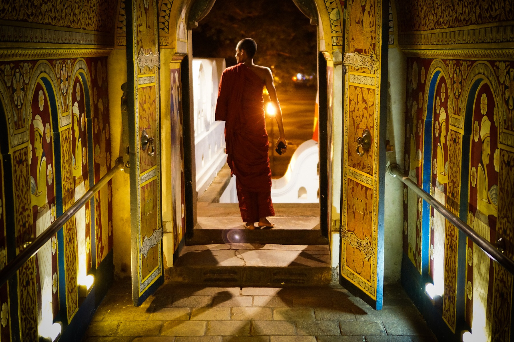 Sony Alpha NEX-5R + Sony E 35mm F1.8 OSS sample photo. A monk, looking for his friends after visiting the ... photography
