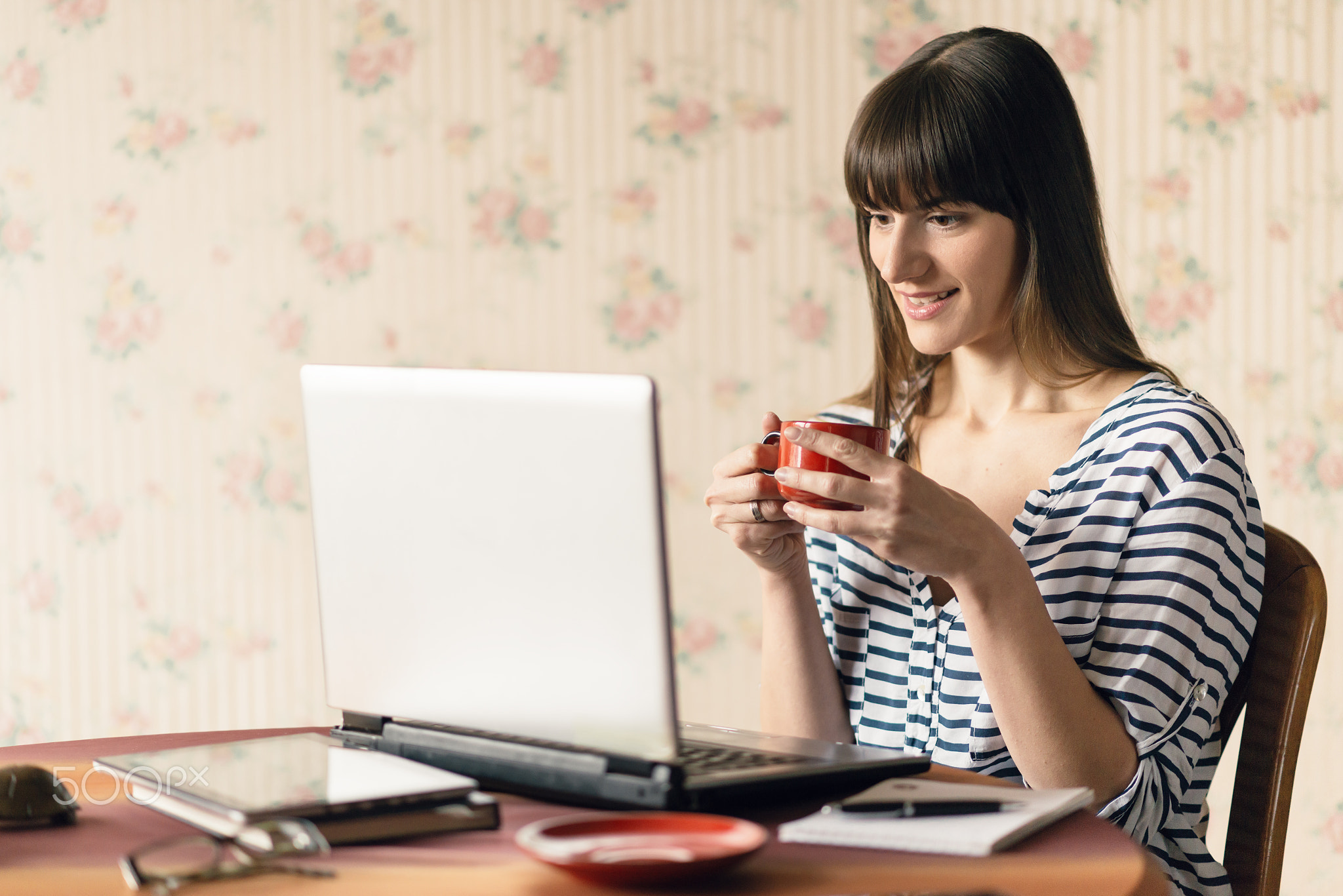 businesswoman using a digital tablet at her office