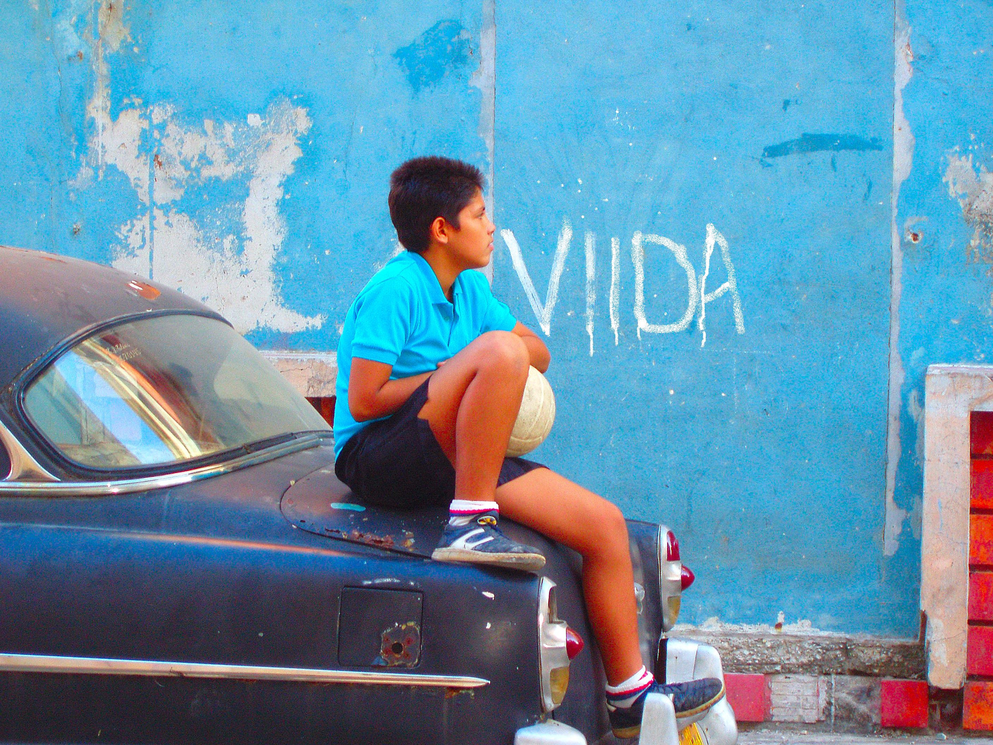Olympus X-3,C-60Z sample photo. Cuban boy havana photography