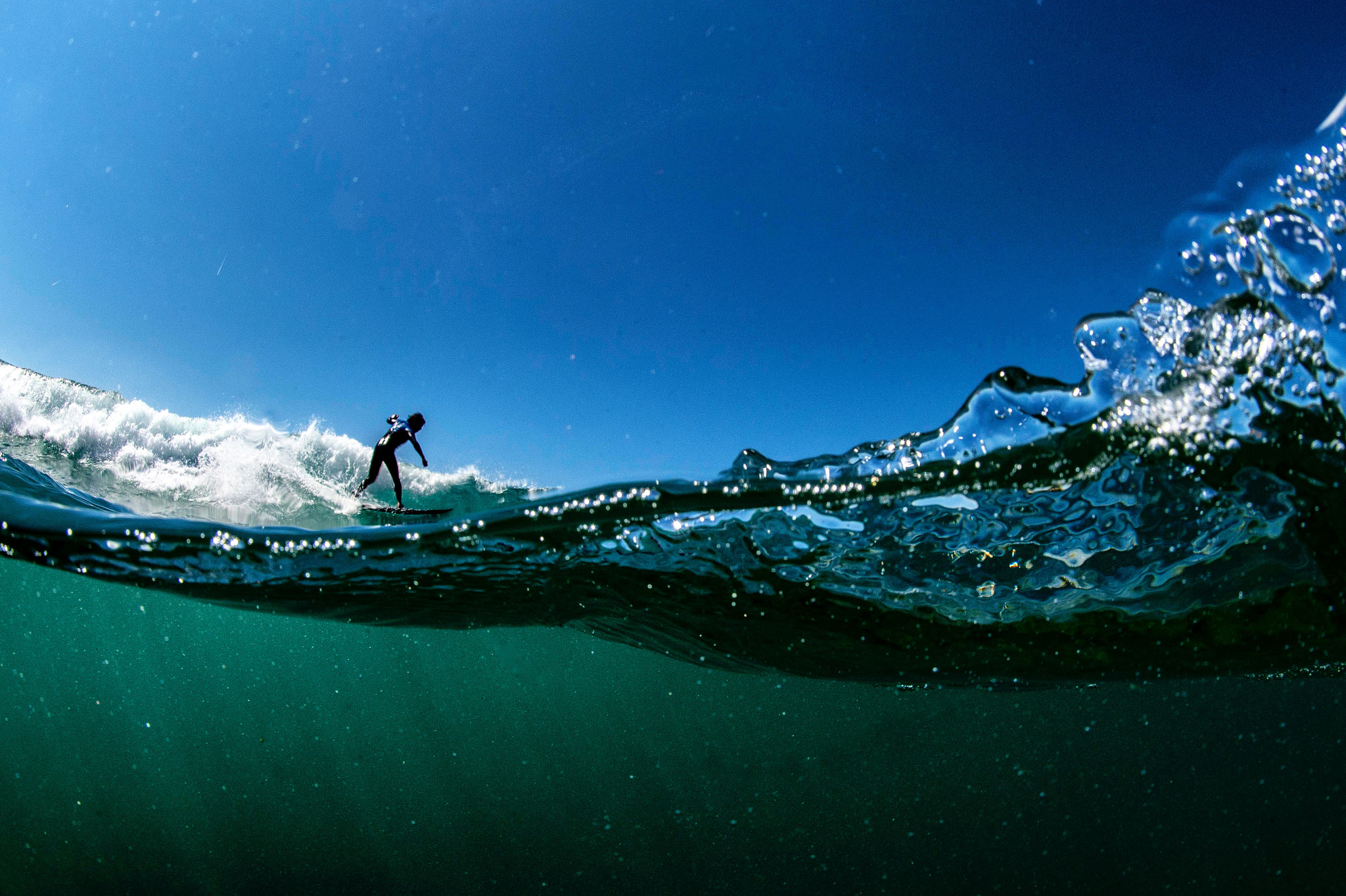 Nikon D4S + Nikon AF Fisheye-Nikkor 16mm F2.8D sample photo. Surfing a little glassy day in liguria photography