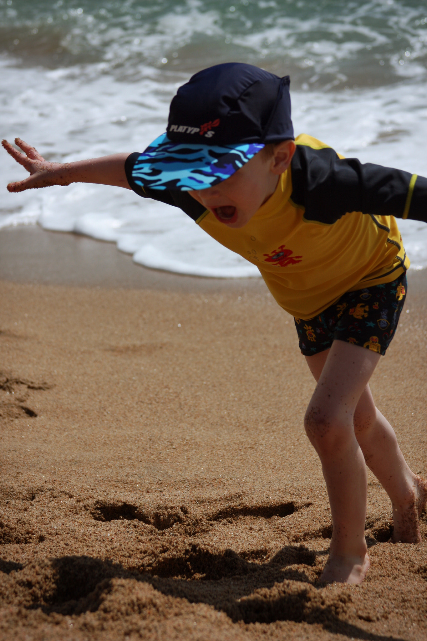 Canon EF 28-135mm F3.5-5.6 IS USM sample photo. Beach fun photography