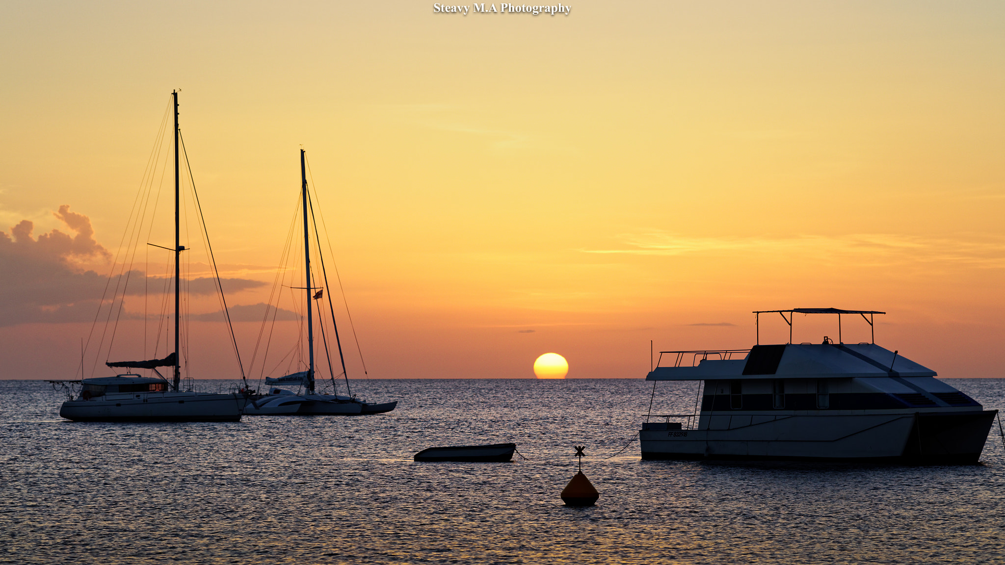 ZEISS Apo Sonnar T* 135mm F2 sample photo. Sea eating sun... photography