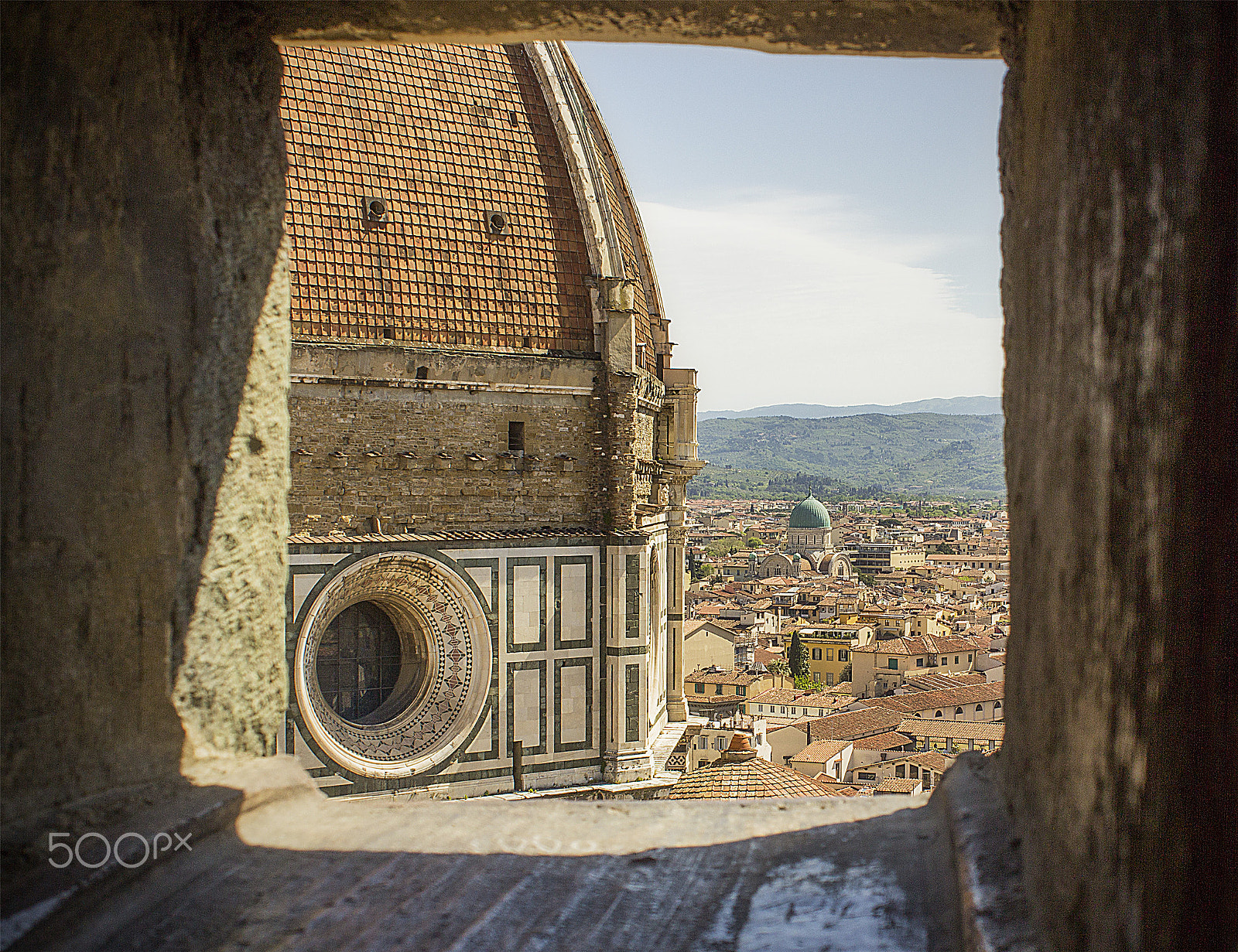 Canon EOS 600D (Rebel EOS T3i / EOS Kiss X5) + Canon EF 28mm F2.8 sample photo. Through the window of the bell tower photography