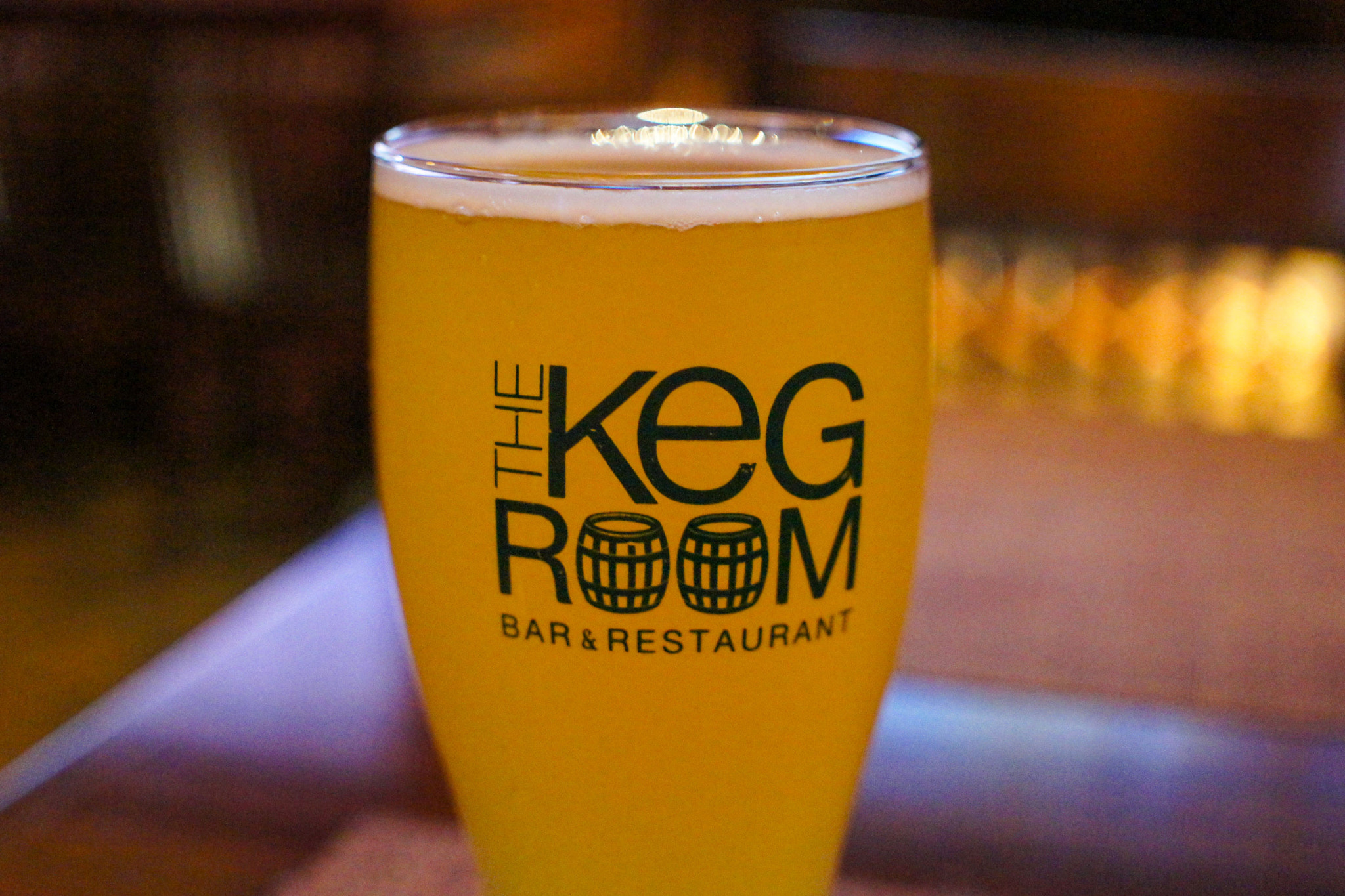 Sony Alpha NEX-5 + Sigma 30mm F2.8 EX DN sample photo. Golden beer at the keg room (nyc) photography