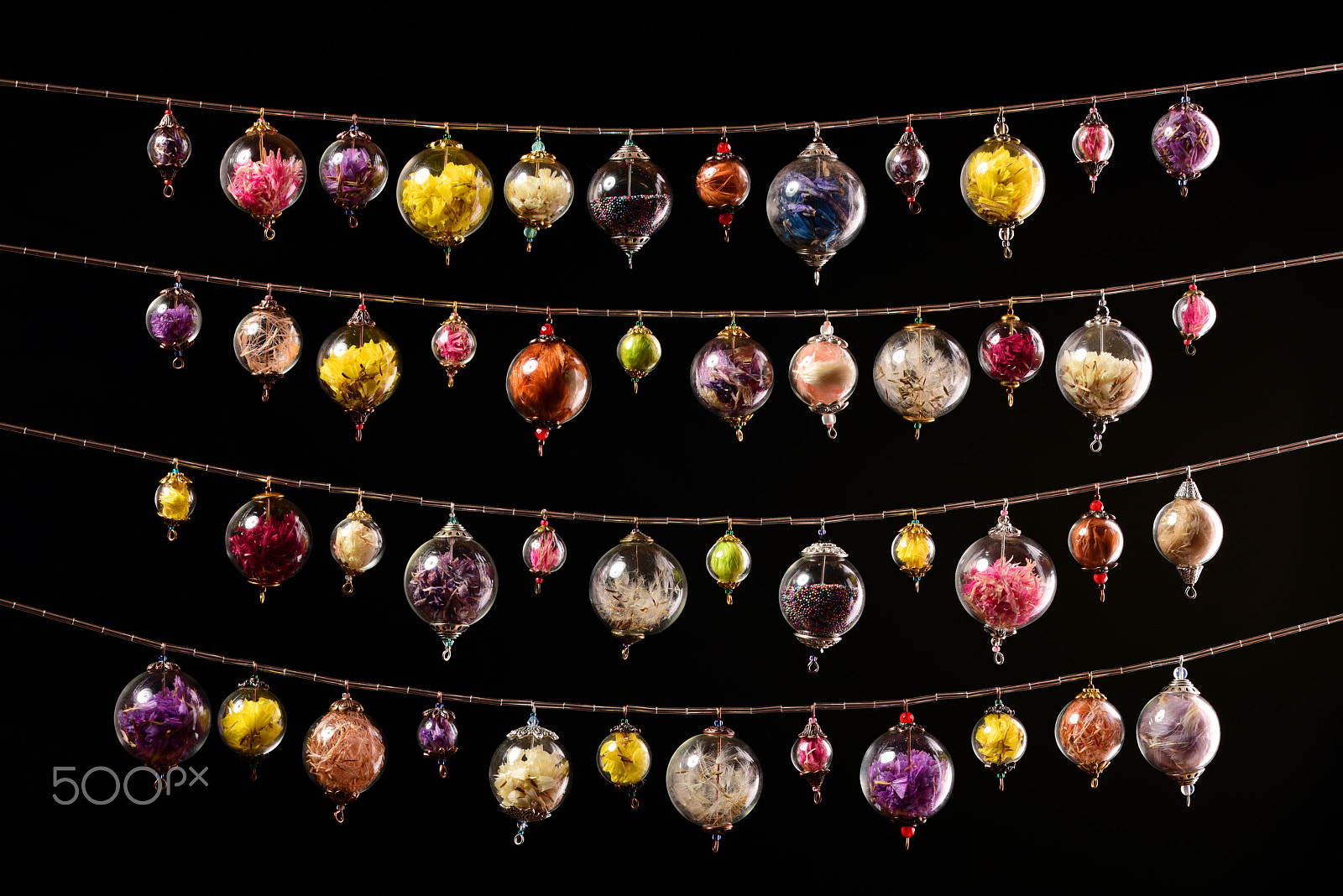 Sigma 150mm F2.8 EX DG OS Macro HSM sample photo. Colorful glass spheres garland on black photography