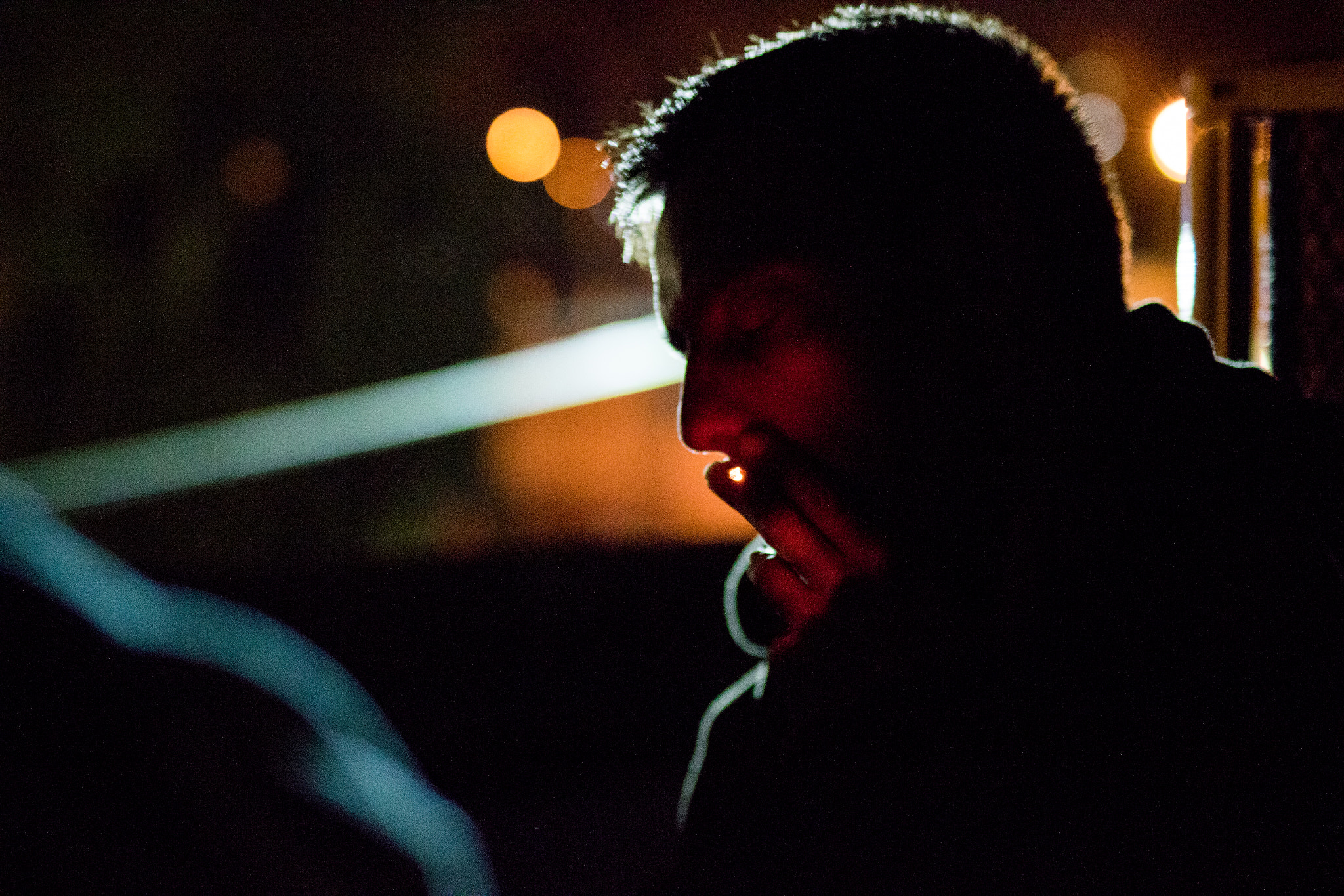 Sigma 50mm F1.4 EX DG HSM sample photo. Smoking at night photography