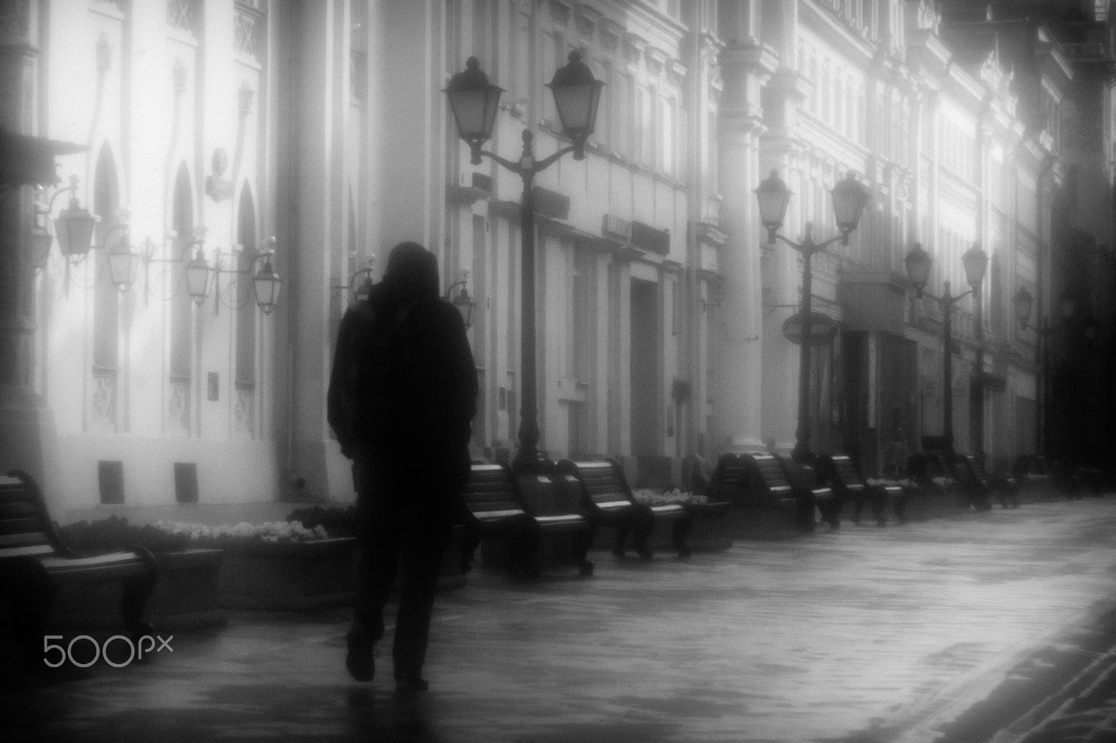 Canon EF 35-80mm f/4-5.6 sample photo. A lone passerby photography