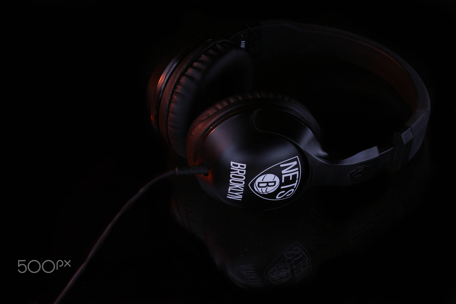 Canon EF 75-300mm F4.0-5.6 IS USM sample photo. Skull candy headphone photography