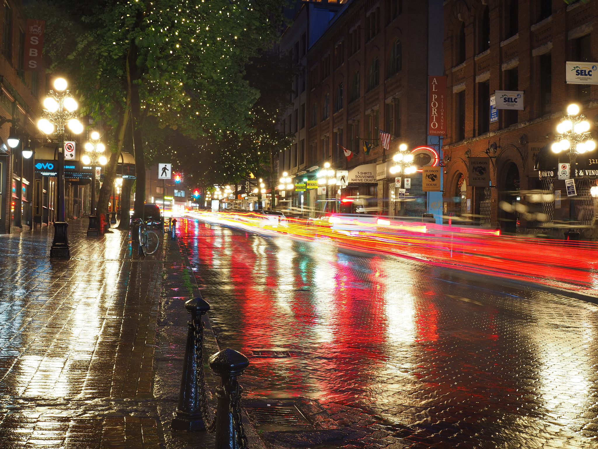 Olympus OM-D E-M10 II + Olympus M.Zuiko Digital 25mm F1.8 sample photo. Gastown lighttrails on a rainy night. downtown vancouver. photography