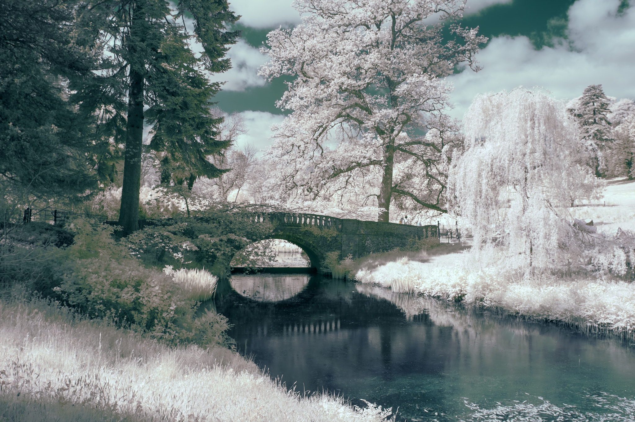 Nikon AF-S Nikkor 18-35mm F3.5-4.5G ED sample photo. Stunning infrared landscape image of old bridge over river in co photography