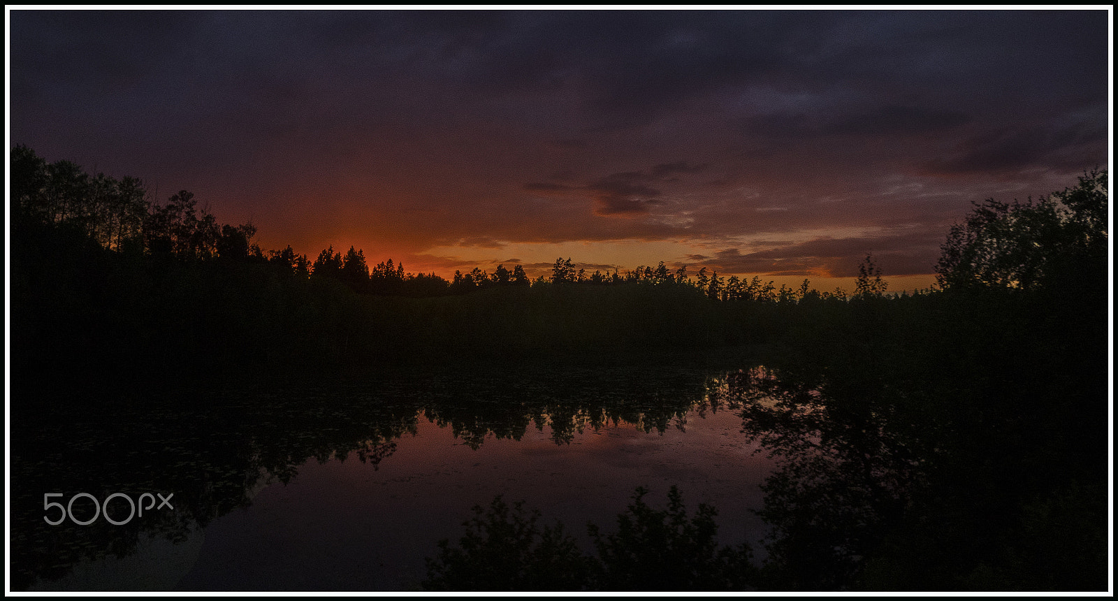 Olympus OM-D E-M5 II + OLYMPUS M.12mm F2.0 sample photo. Reflecting sunset photography