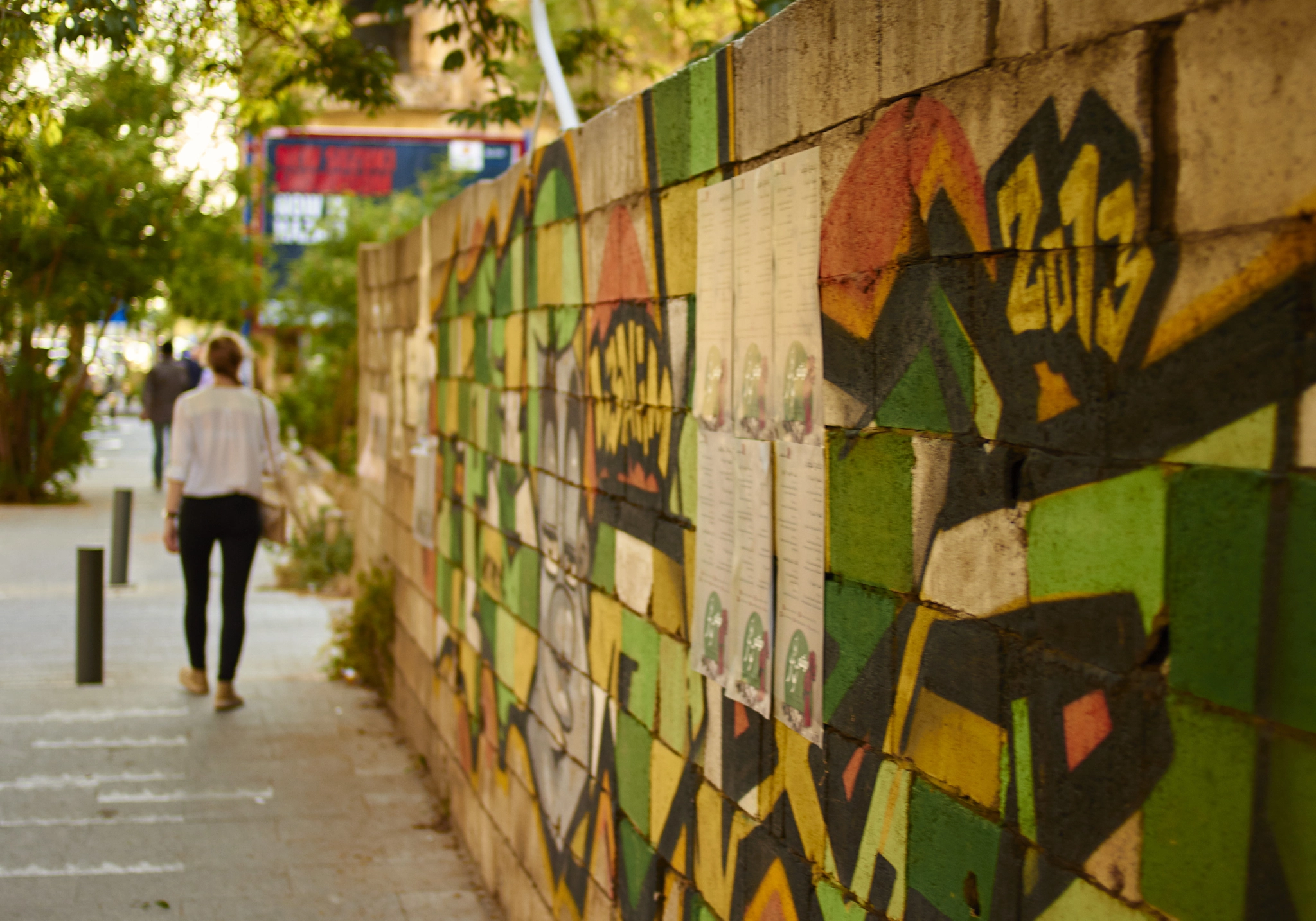 Canon EOS 7D + Canon EF 35mm F2 sample photo. Walking girl and street art in beirut photography