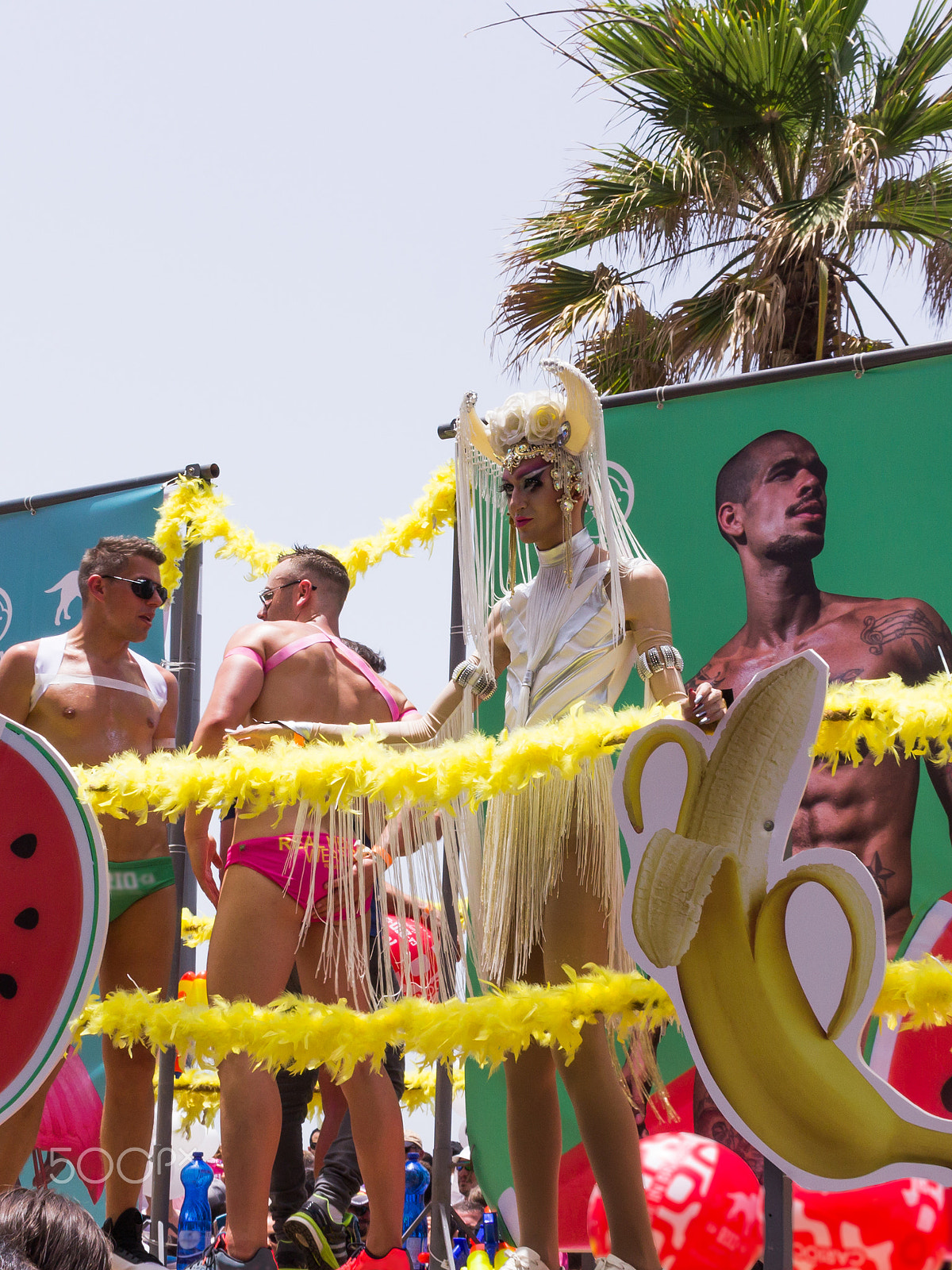 Canon EF 75-300mm F4.0-5.6 IS USM sample photo. Members of pride parade poses for the photographer photography