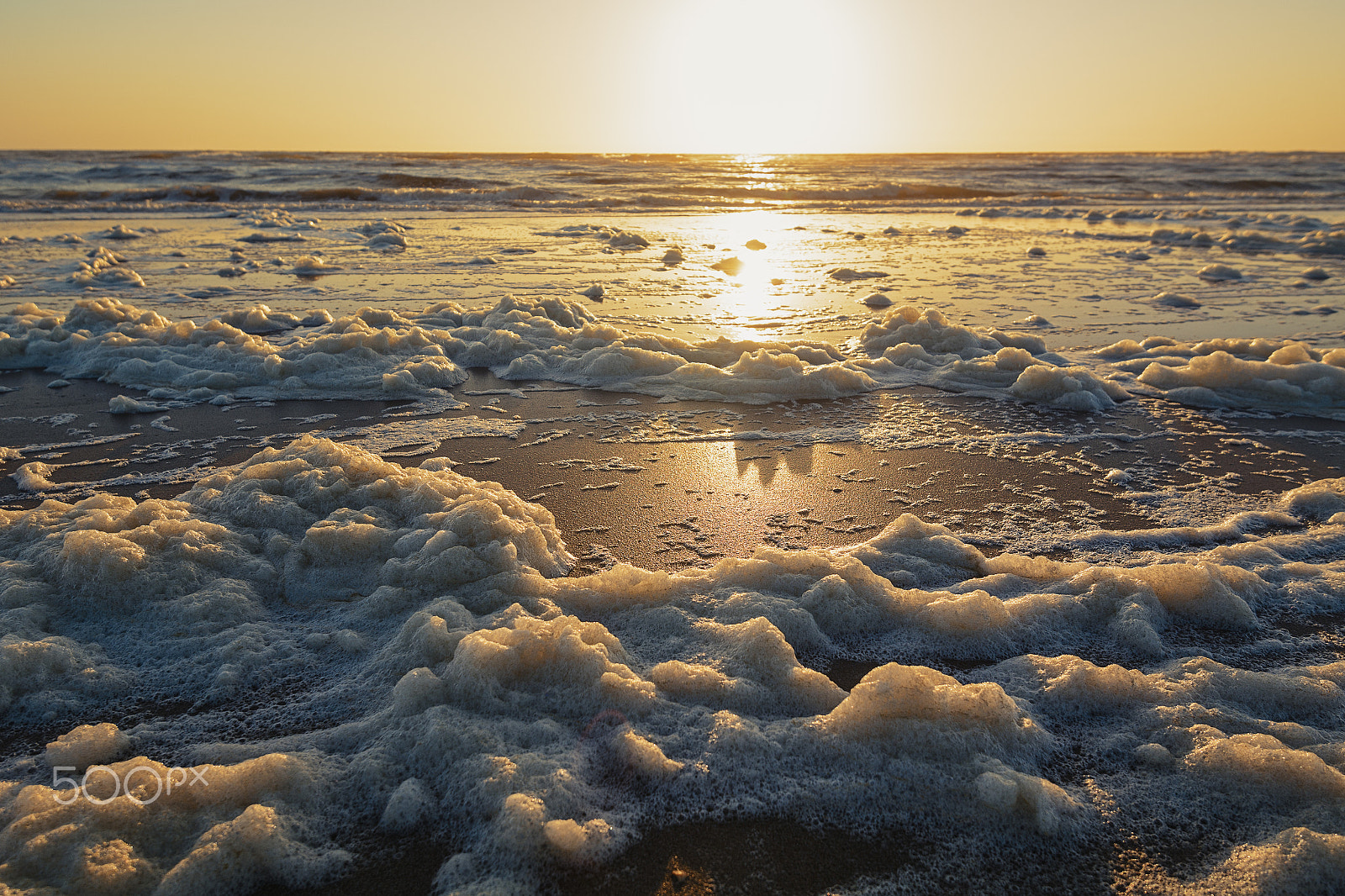Nikon D7100 + Nikon AF-S Nikkor 16-35mm F4G ED VR sample photo. Sea foam on the shore of the north sea. photography