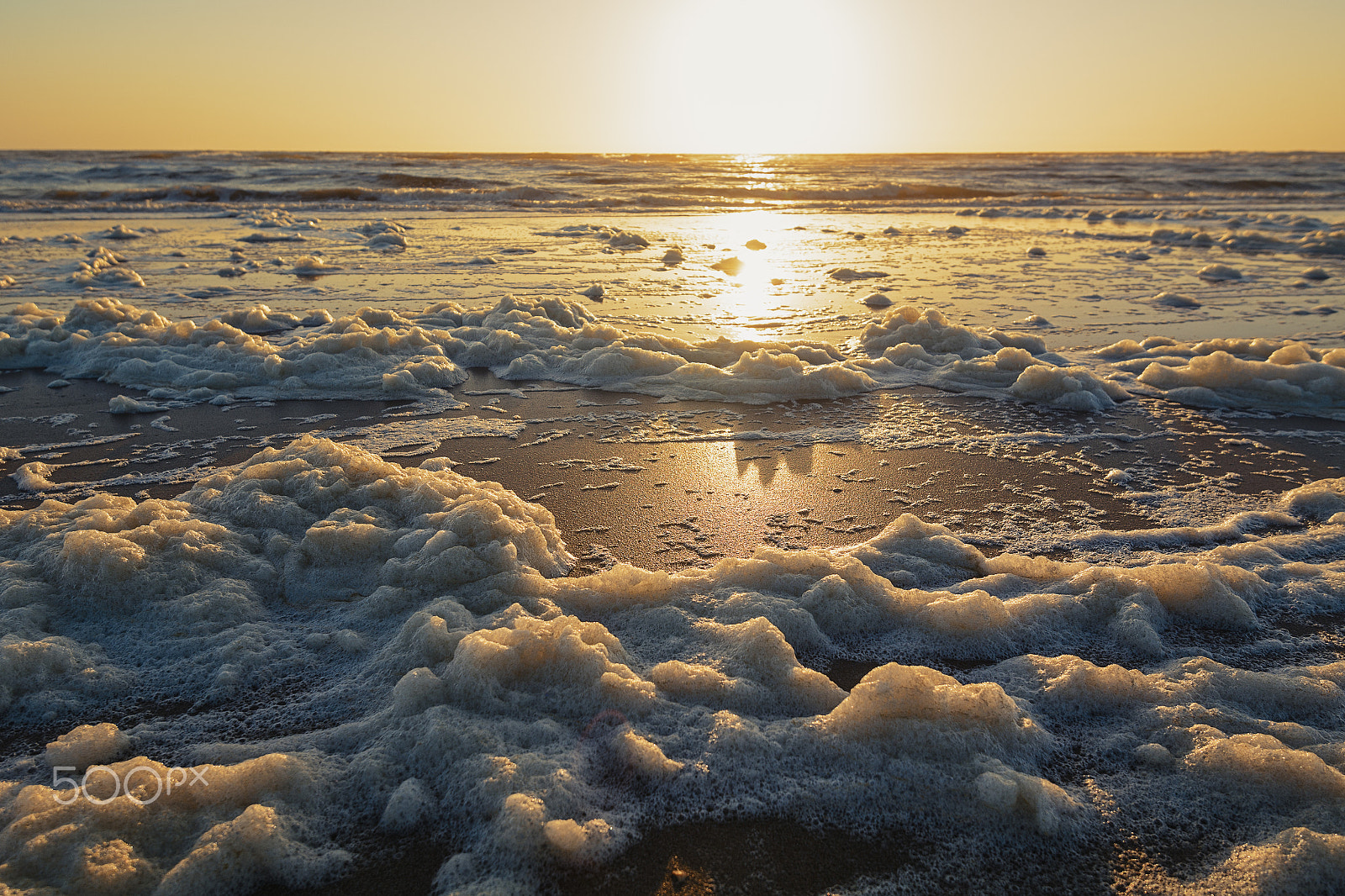 Nikon AF-S Nikkor 16-35mm F4G ED VR sample photo. Sea foam on the shore of the north sea. photography