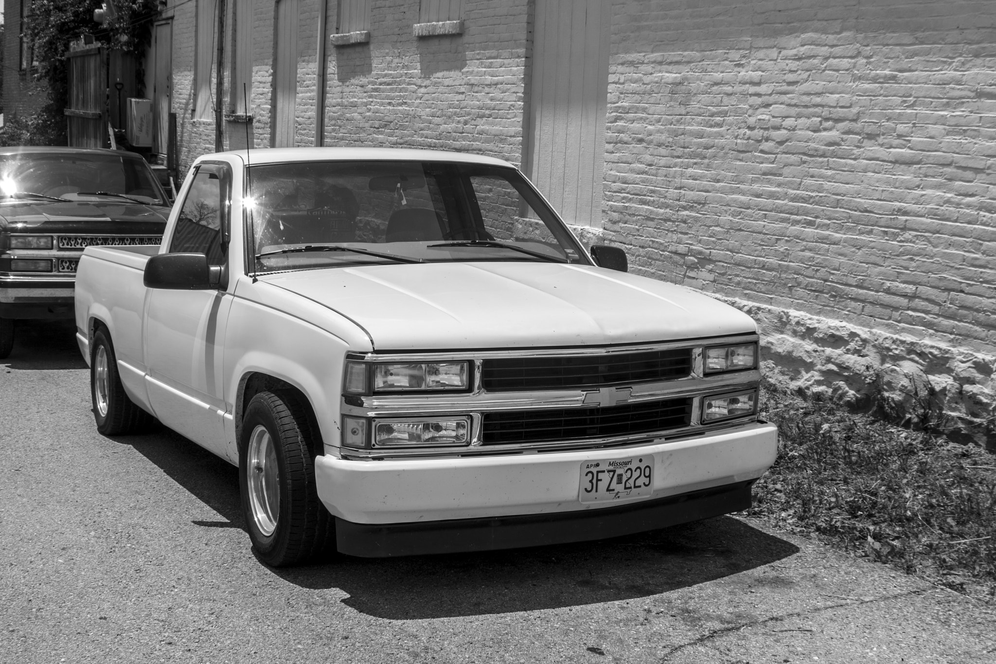 Canon EF 28-80mm f/3.5-5.6 sample photo. White silverado photography