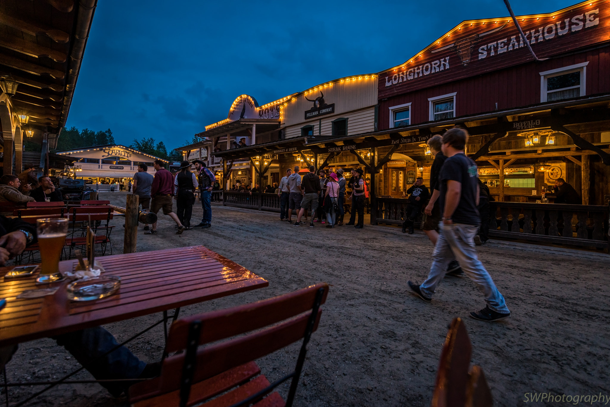 Sony a7 II + Canon EF 300mm f/2.8L sample photo. Evening walk in western town photography