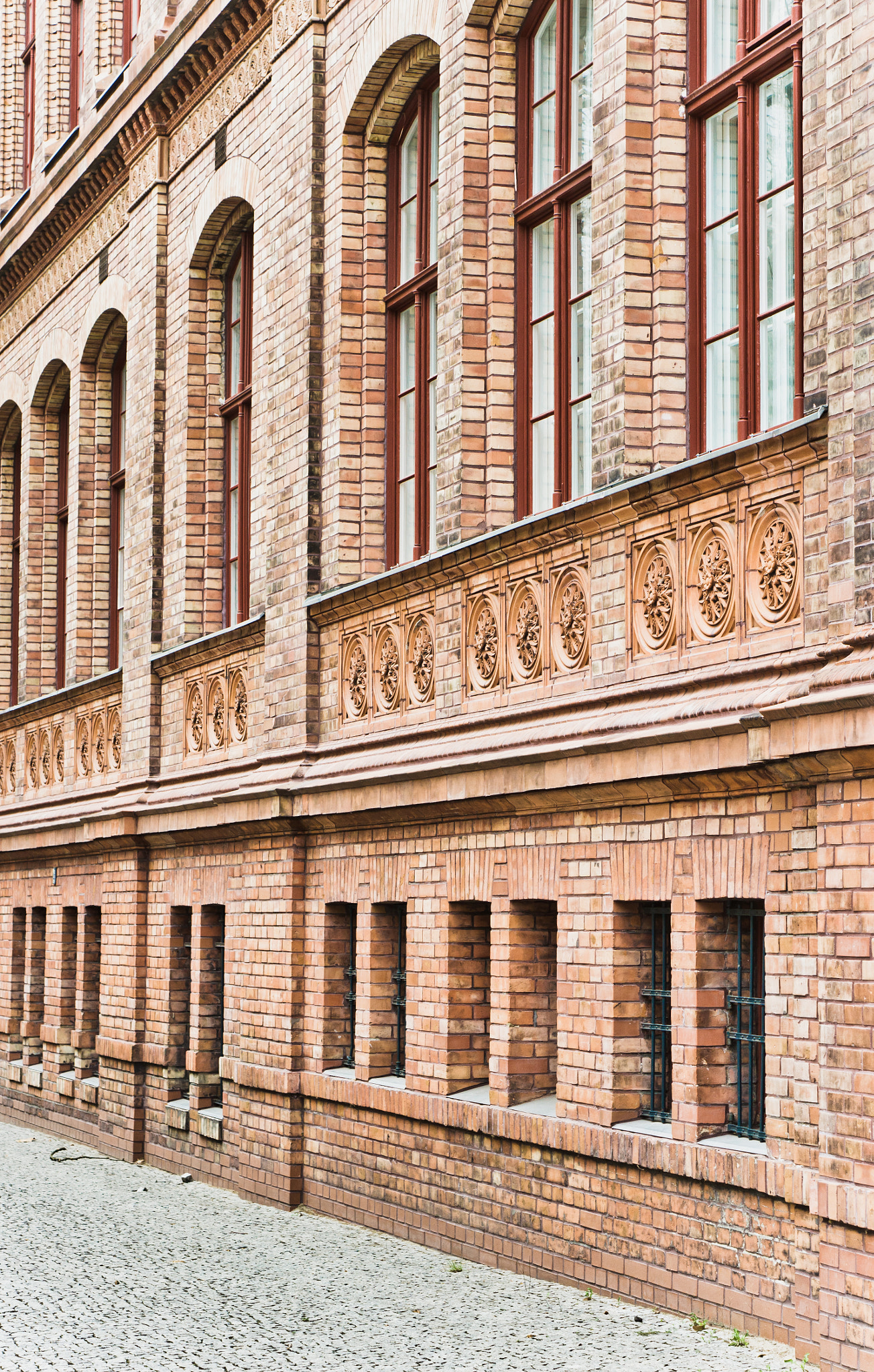 Sony Alpha NEX-5 + E 50mm F1.8 OSS sample photo. Red brick building photography
