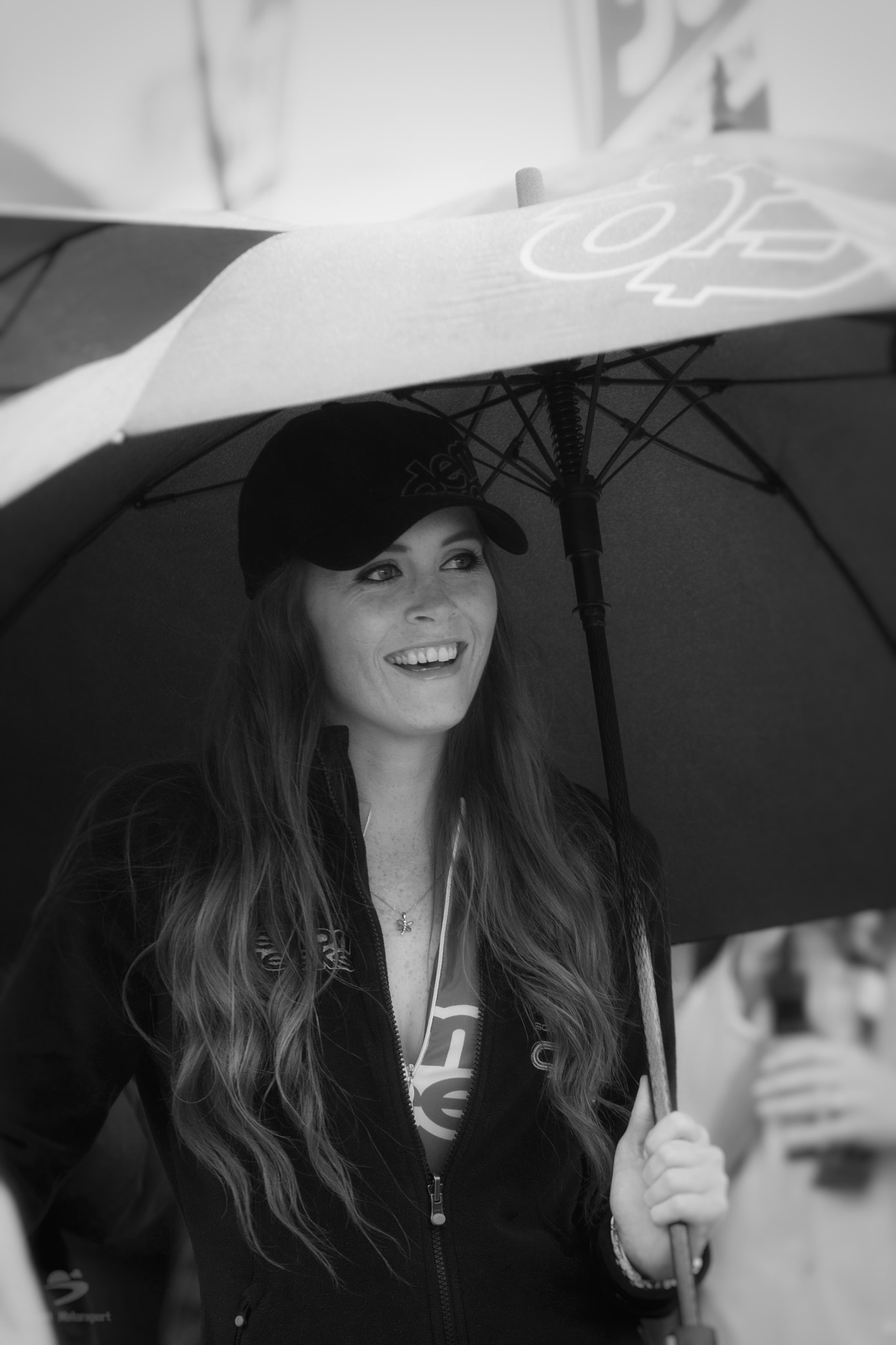 Canon EOS 30D + Canon EF 70-200mm F4L USM sample photo. Grid girl in the rain at silverstone photography