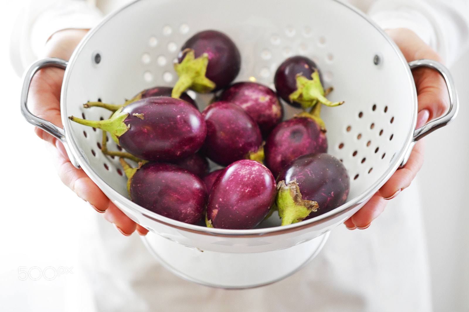 Nikon D3100 sample photo. Baby eggplant in white strainer photography