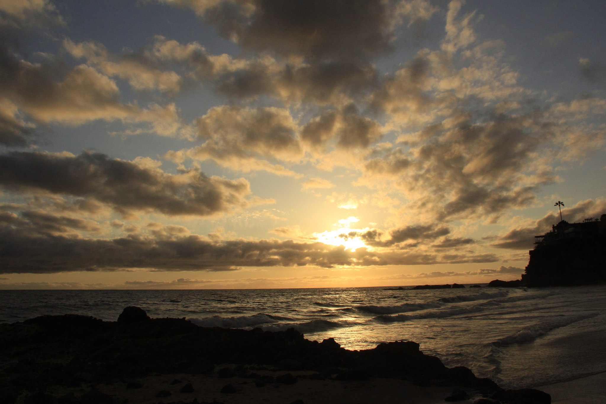 Canon EF-S 18-200mm F3.5-5.6 IS sample photo. Beach on a cloudy day photography
