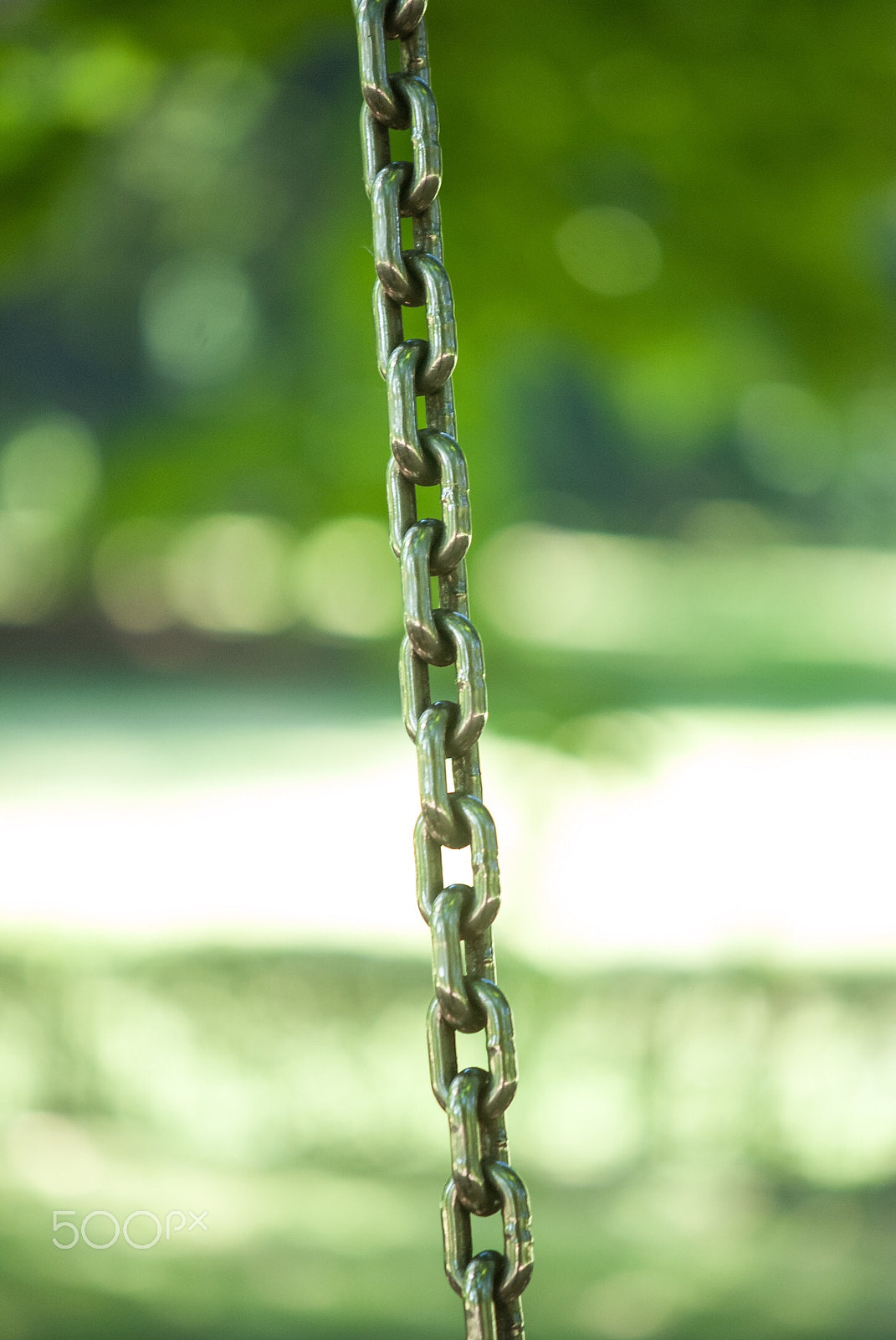 Nikon AF-S DX Micro-Nikkor 85mm F3.5G ED VR sample photo. Swing on chains photography