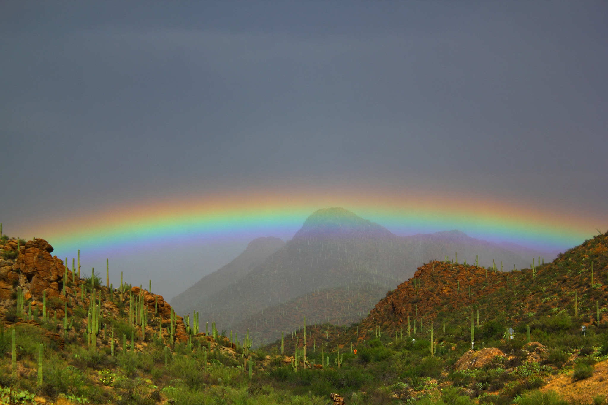 Canon EOS 550D (EOS Rebel T2i / EOS Kiss X4) + Canon EF-S 18-55mm F3.5-5.6 IS sample photo. Gates pass rainbow photography