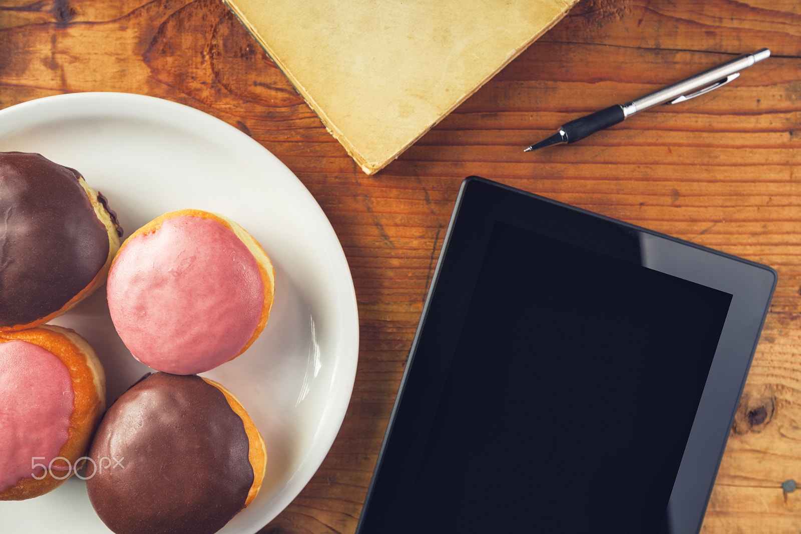 Tamron SP 15-30mm F2.8 Di VC USD sample photo. Delicious donuts and digital tablet computer on the table photography
