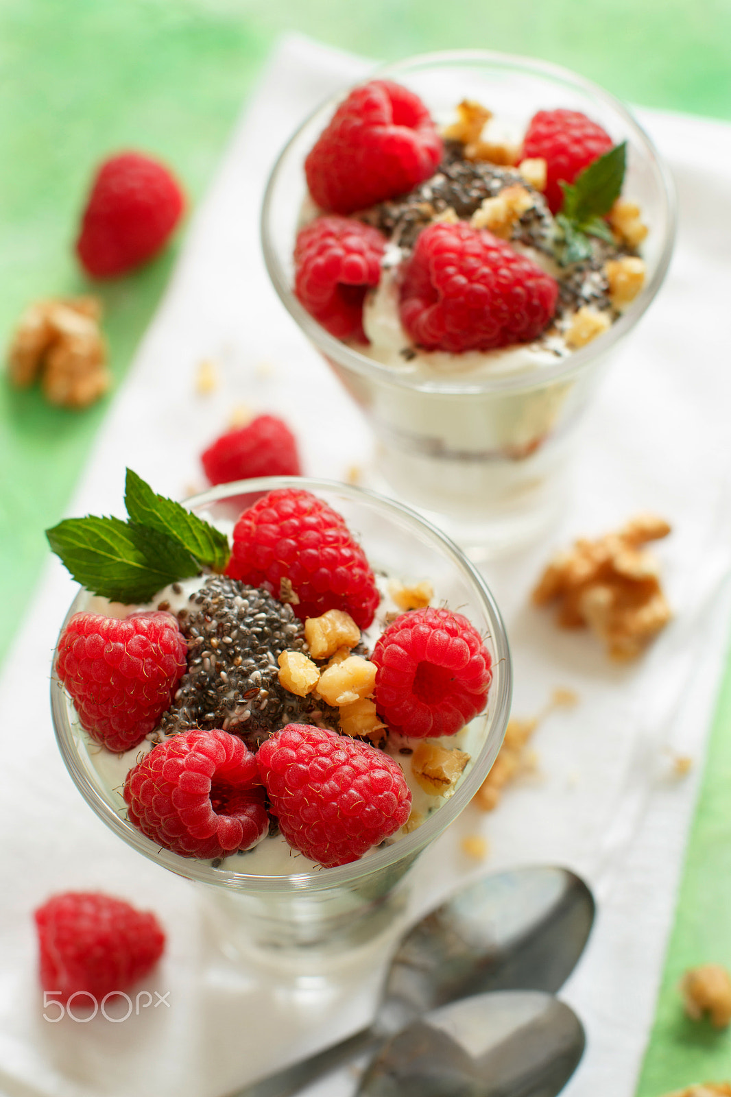 Canon EOS 650D (EOS Rebel T4i / EOS Kiss X6i) + Canon EF 50mm F1.2L USM sample photo. Yogurt with chia seeds, walnuts and raspberries photography