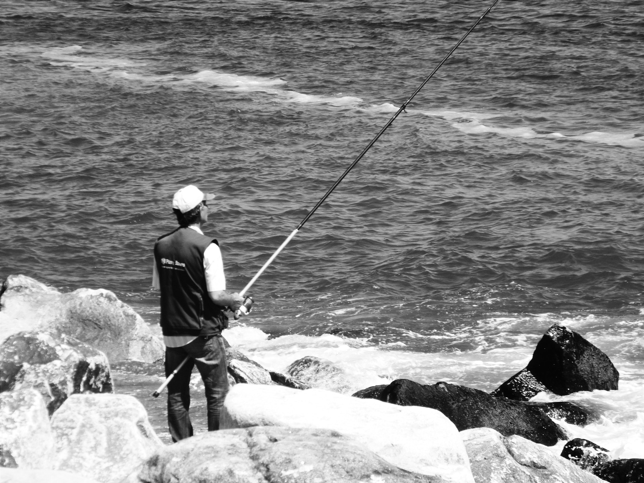 Fujifilm FinePix S2000HD sample photo. Fisherman  photography