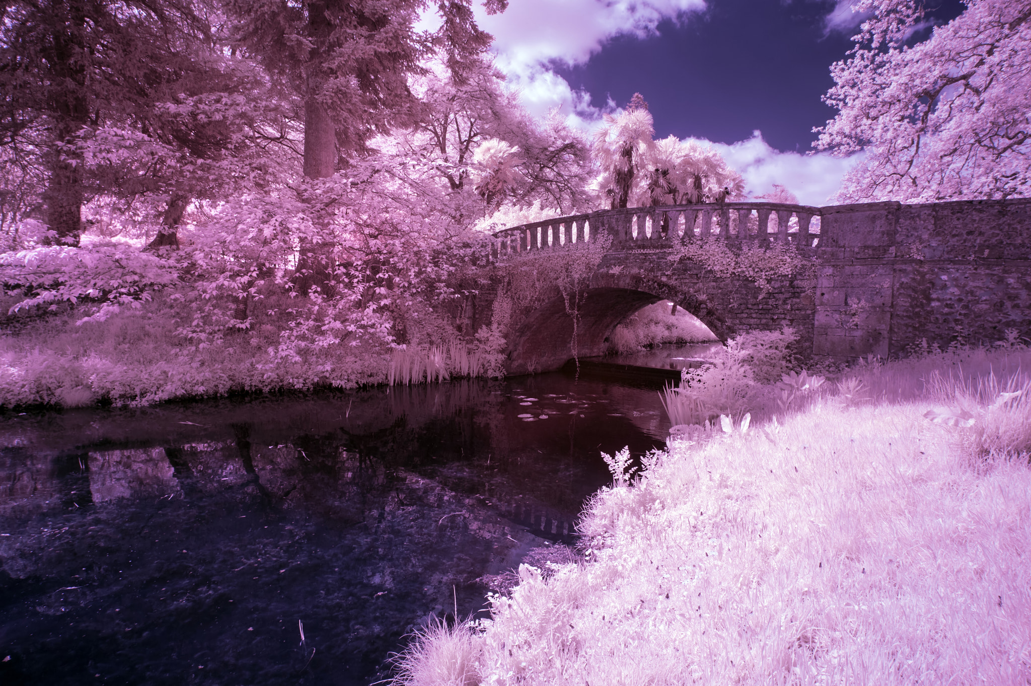 Nikon AF-S Nikkor 18-35mm F3.5-4.5G ED sample photo. Stunning infrared landscape image of old bridge over river in co photography