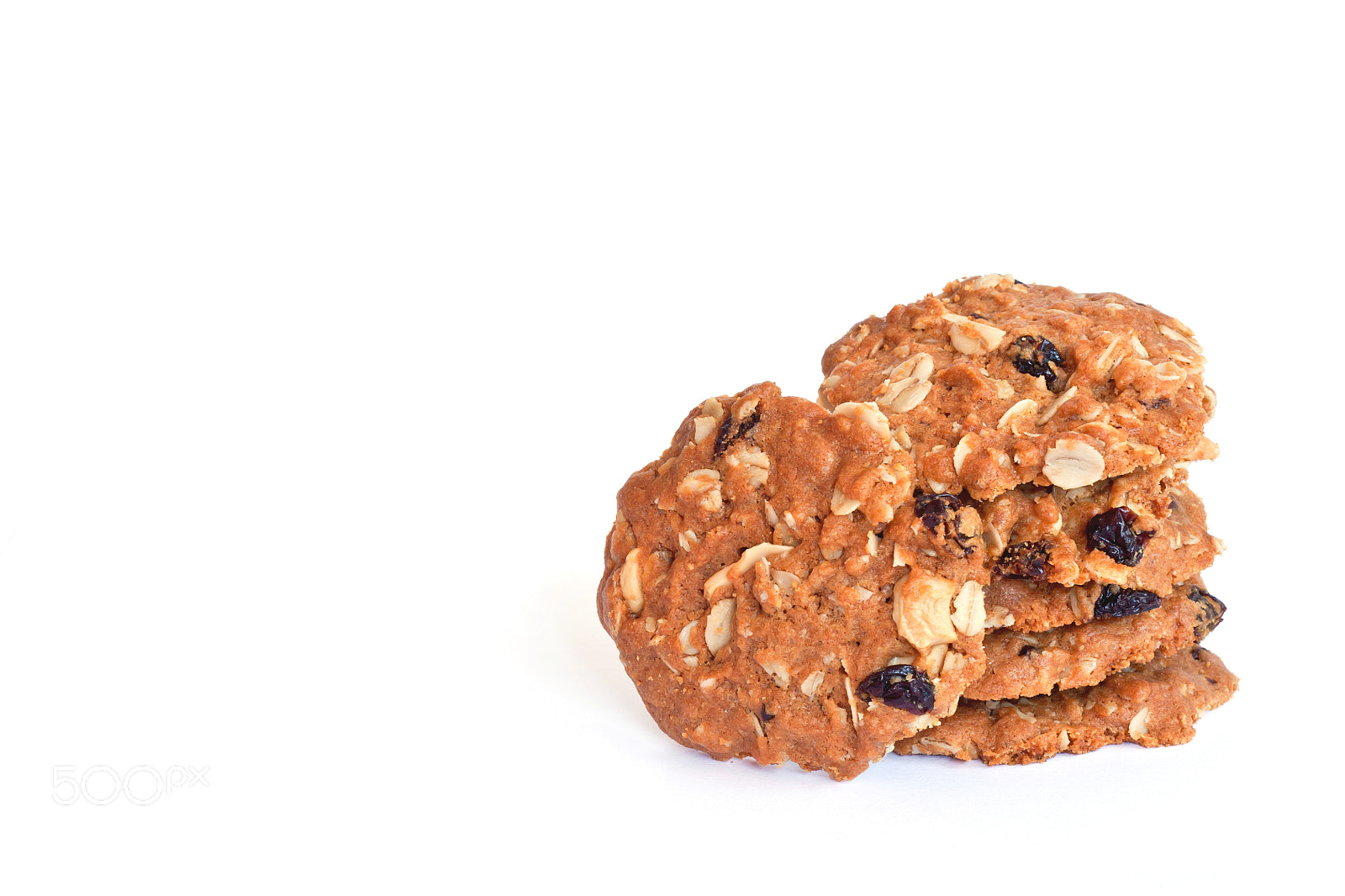 Canon EOS 450D (EOS Rebel XSi / EOS Kiss X2) + Canon EF 50mm F1.8 II sample photo. Cereal cookies isolated over white photography